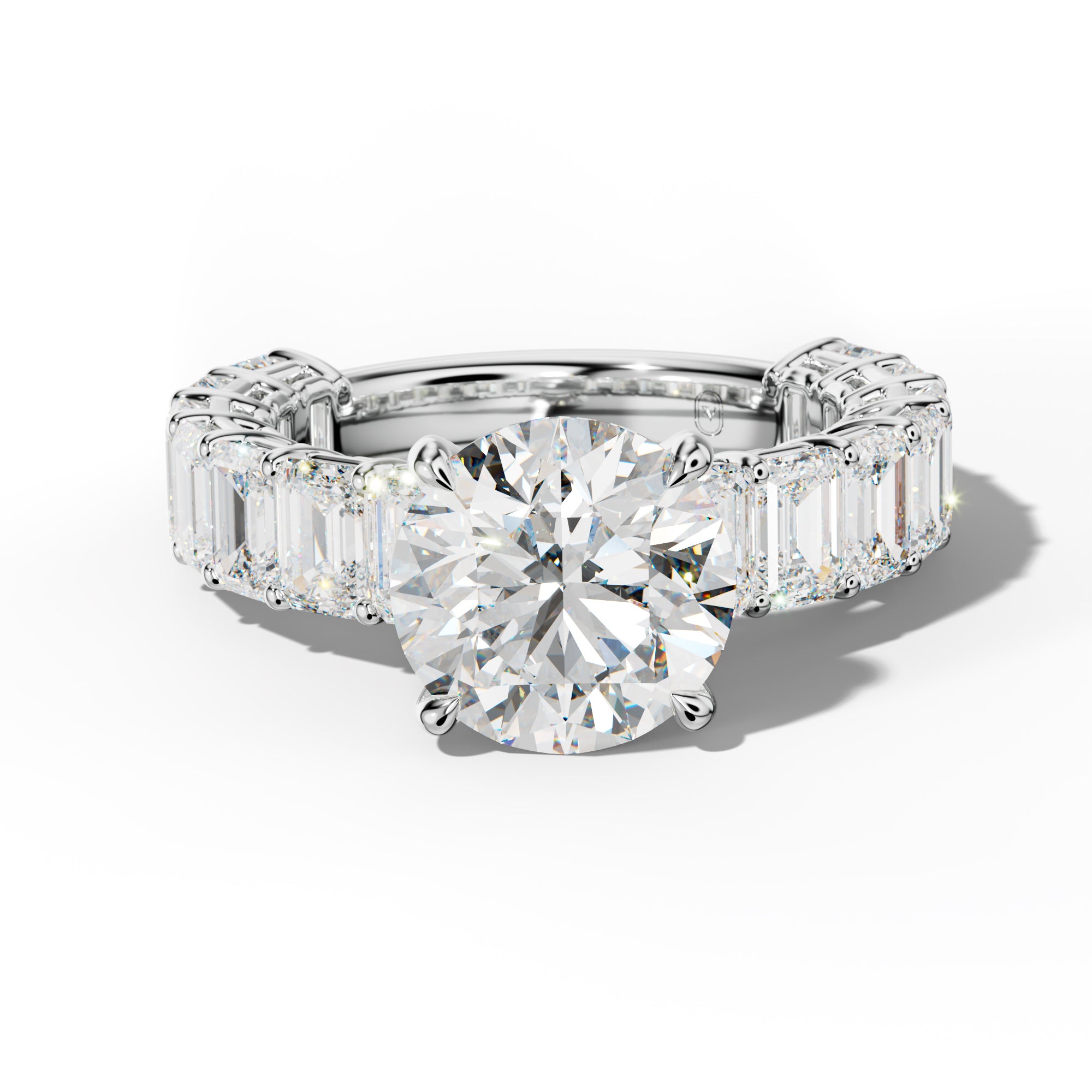 Mina Round Diamond Engagement Ring With Emerald Cut Side Stones