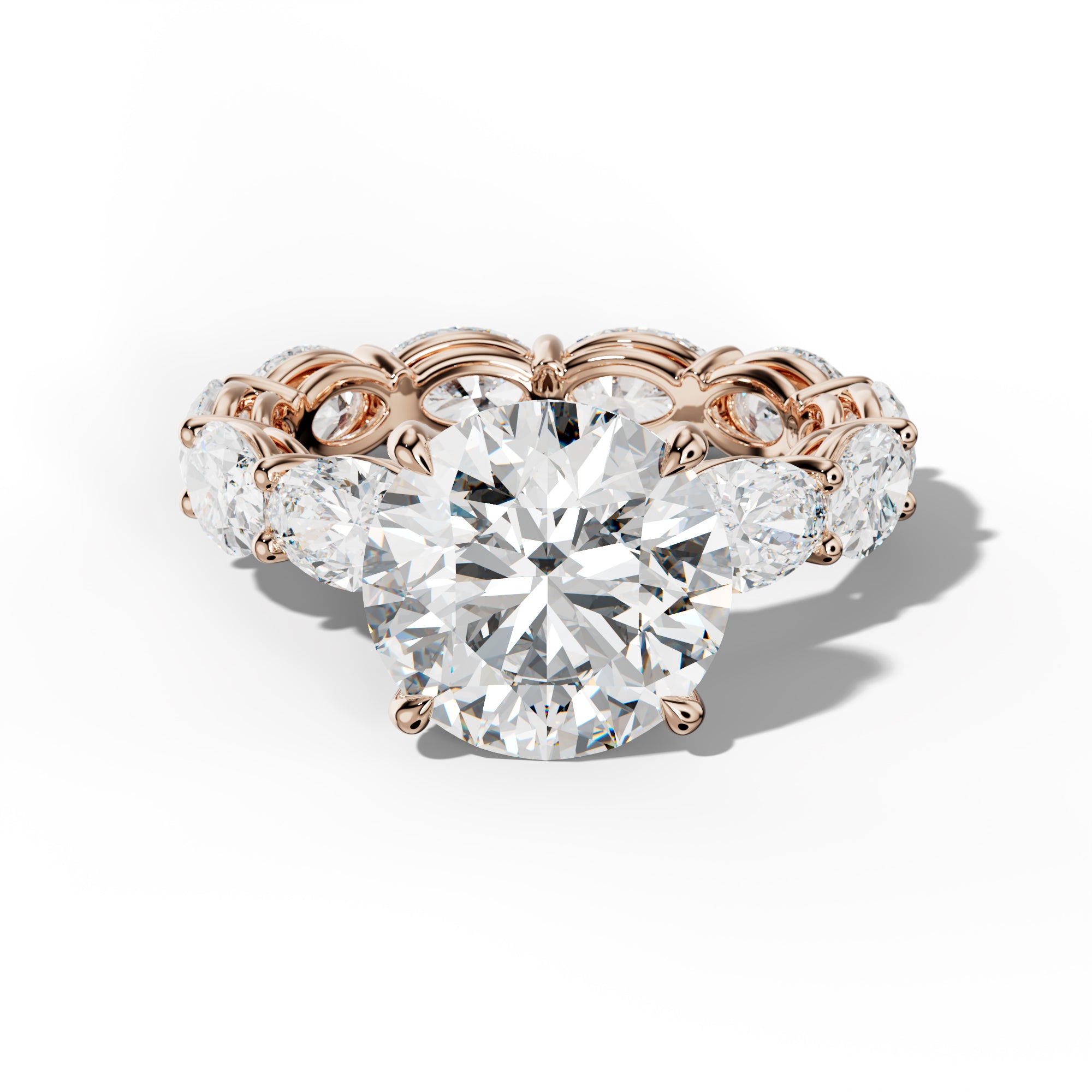 Alessia Round Diamond Engagement Ring With East West Oval Side Stones