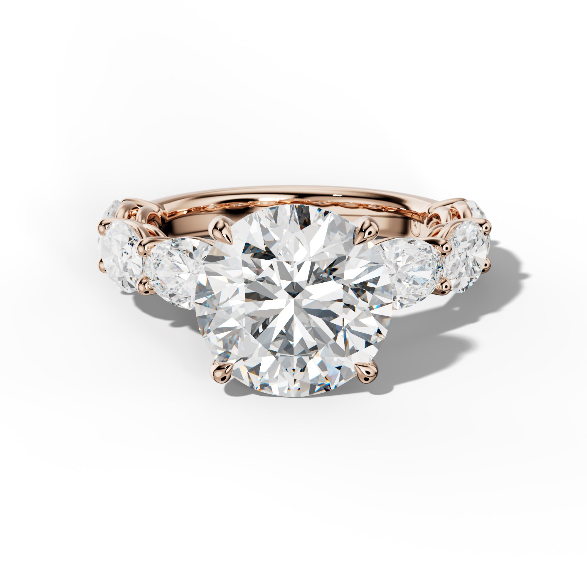 Maci Round Diamond Engagement Ring With East West Oval Side Stones