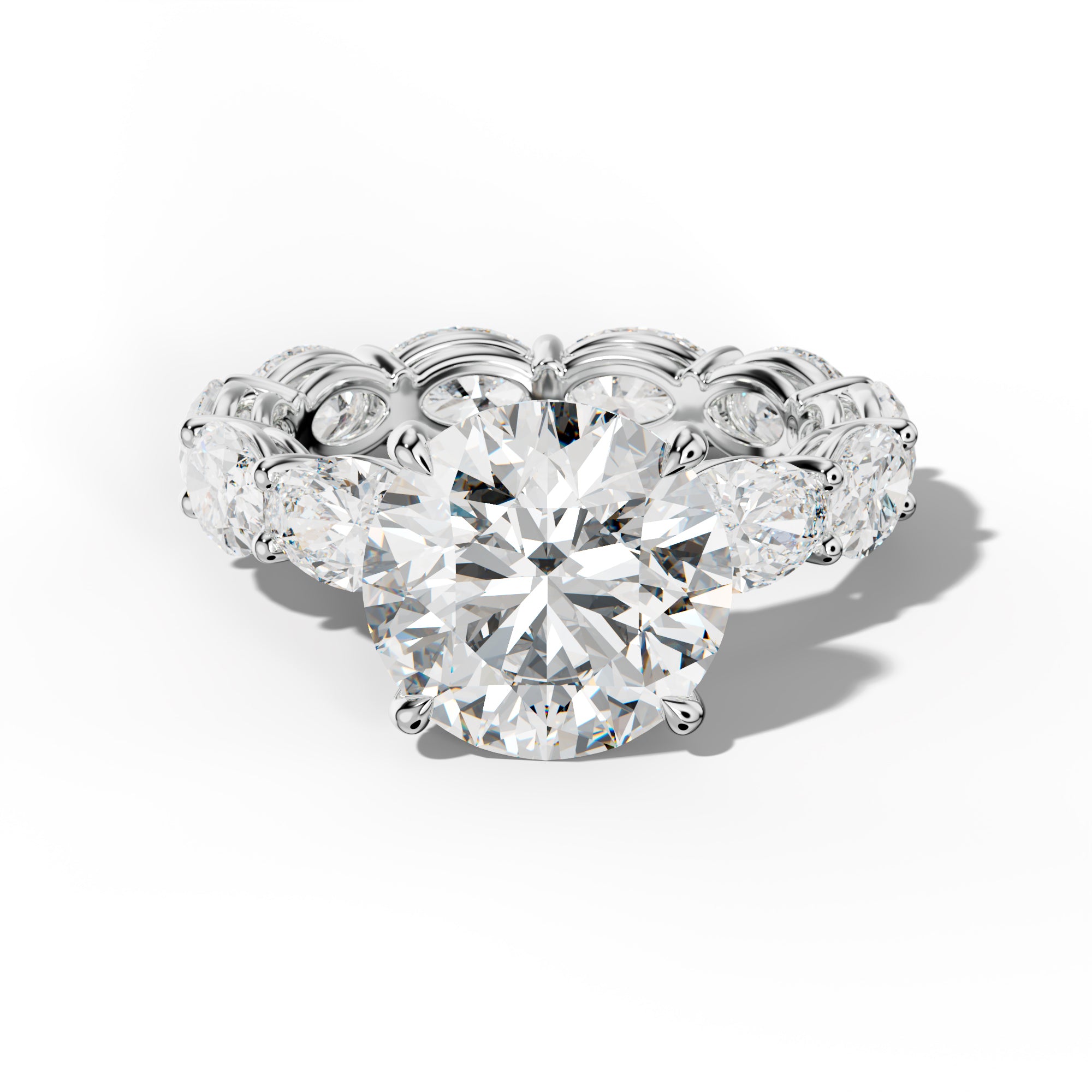 Alessia Round Diamond Engagement Ring With East West Oval Side Stones