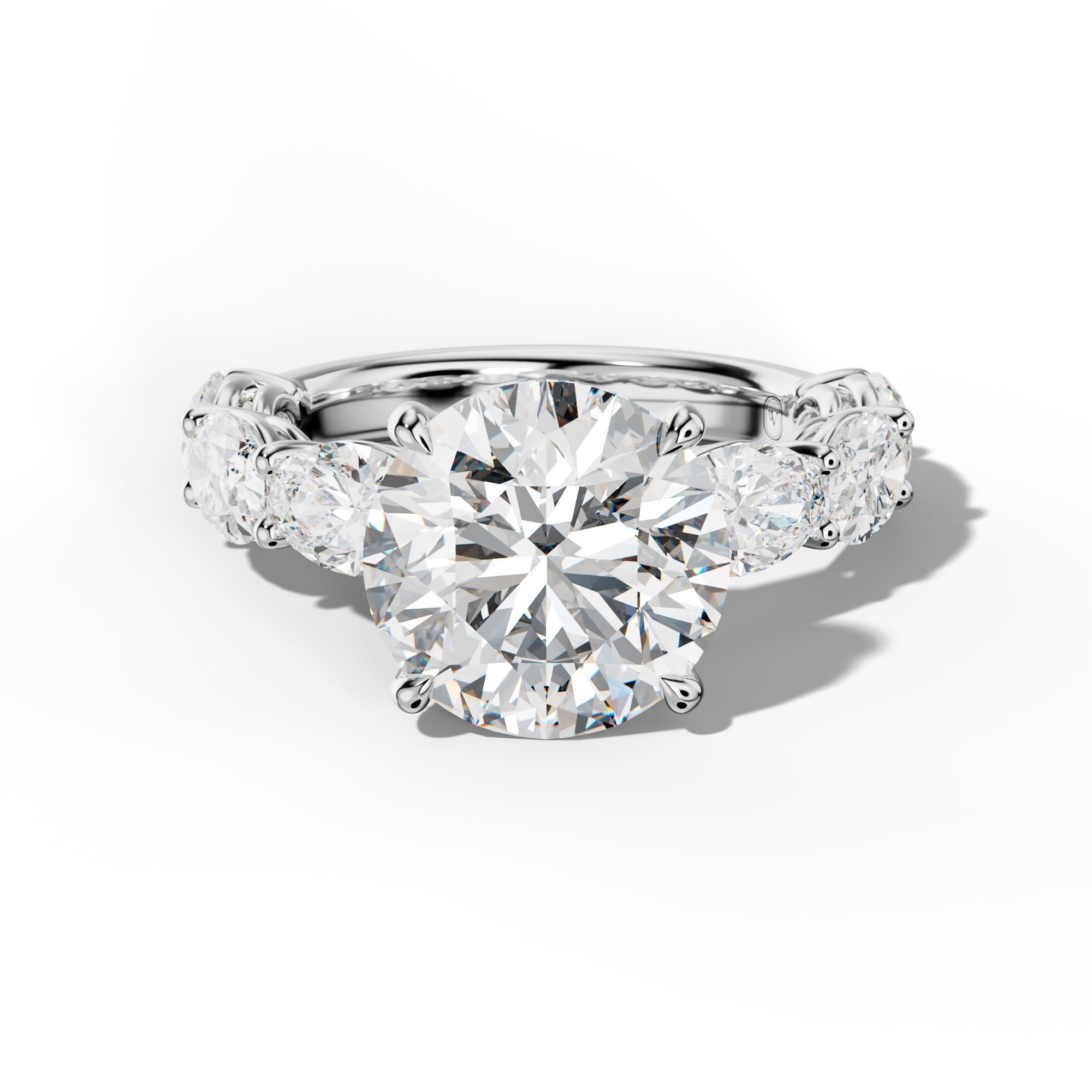 Maci Round Diamond Engagement Ring With East West Oval Side Stones