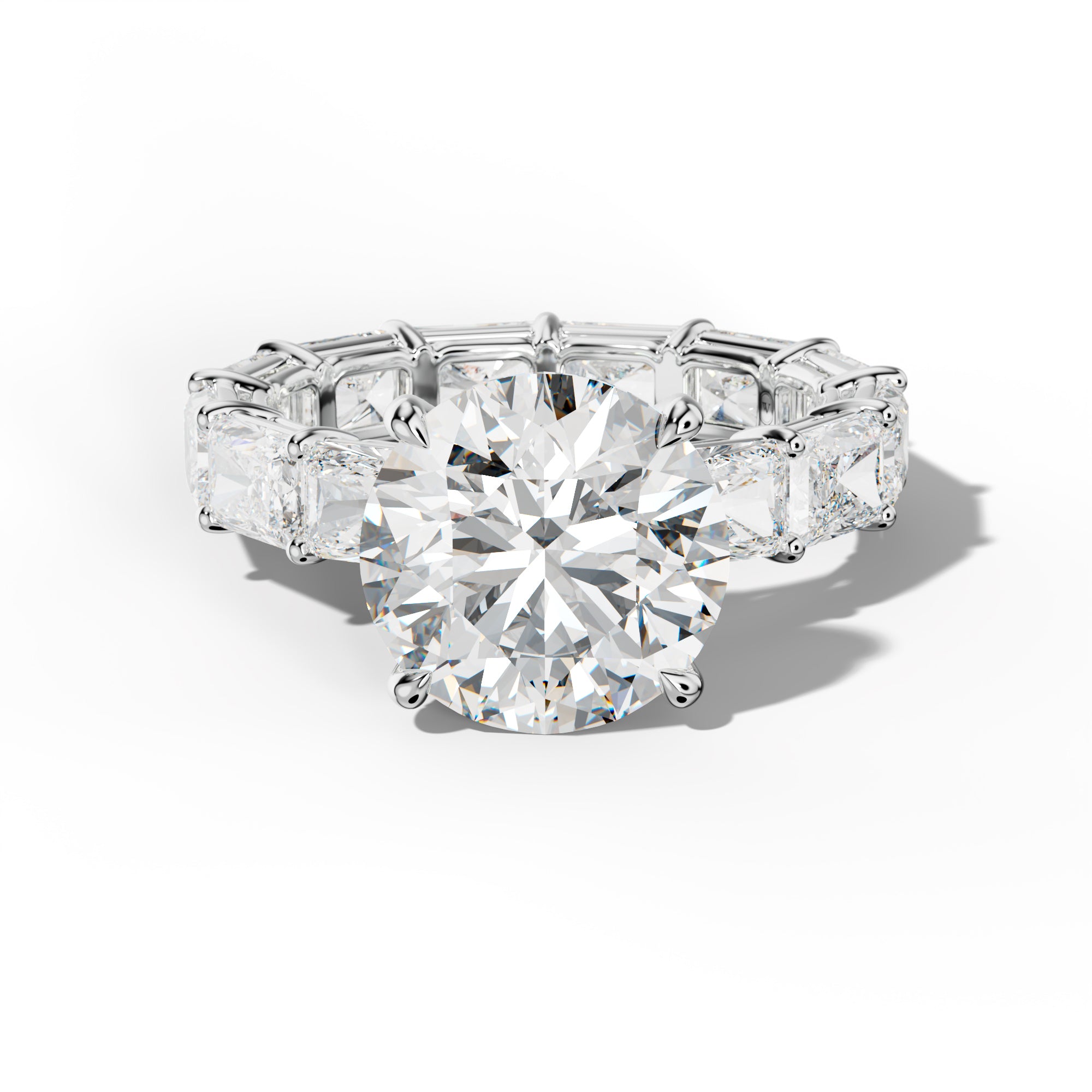 Mavis Round Diamond Engagement Ring With East West Radiant Side Stones