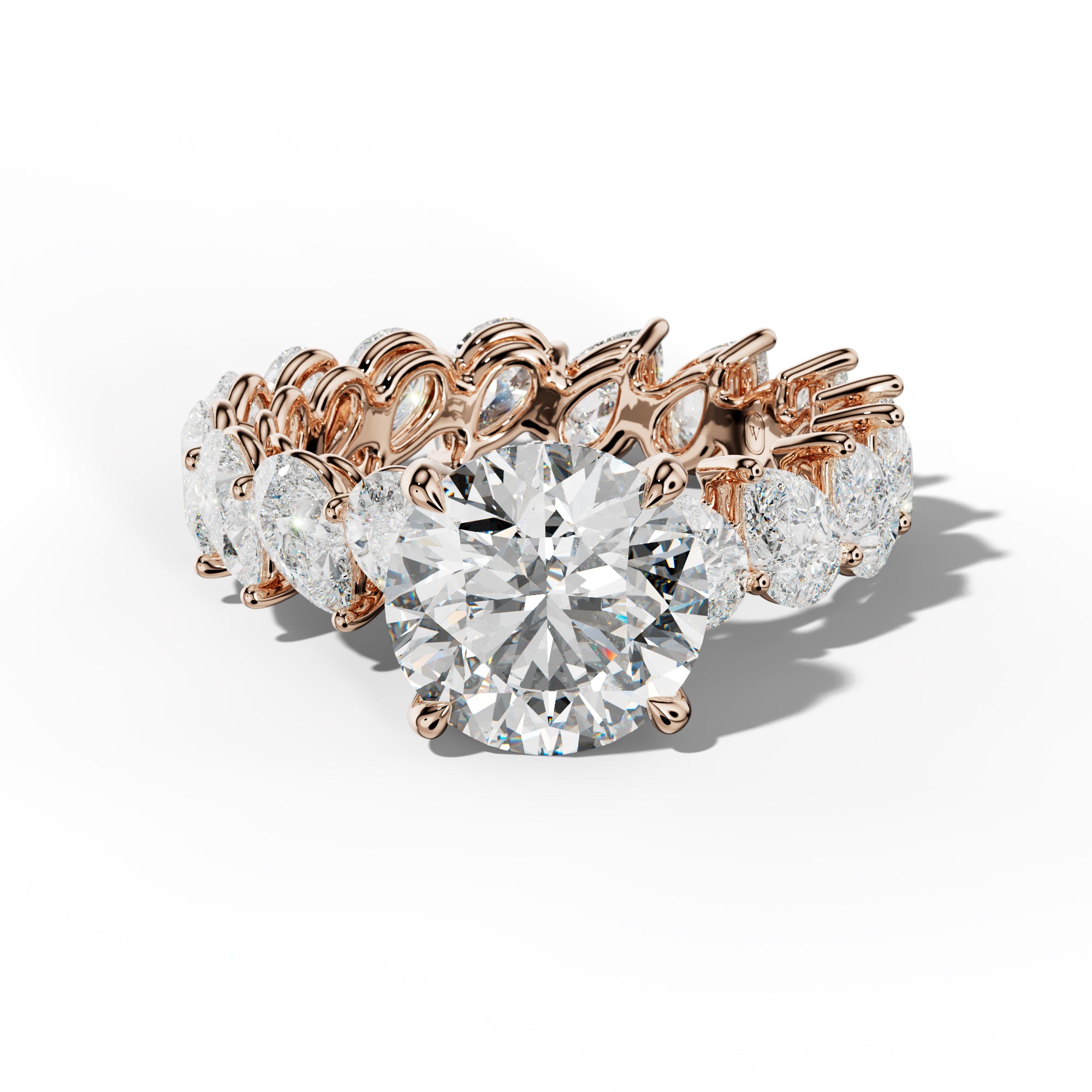 Quinn Round Diamond Engagement Ring With Slanted Pear Side Stones