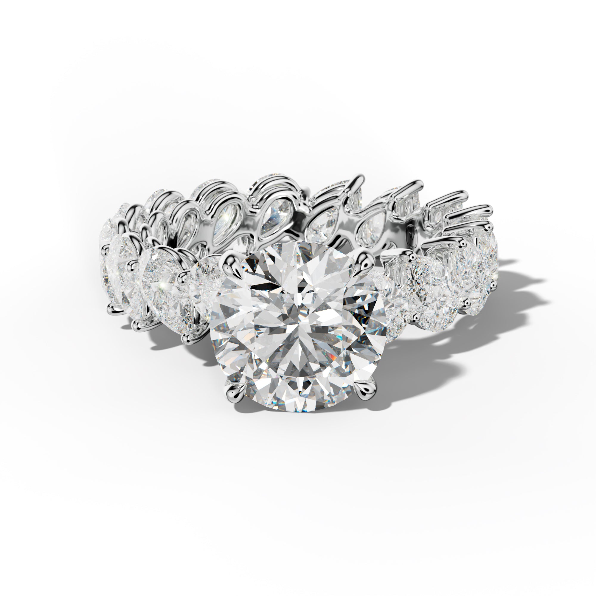 Quinn Round Diamond Engagement Ring With Slanted Pear Side Stones