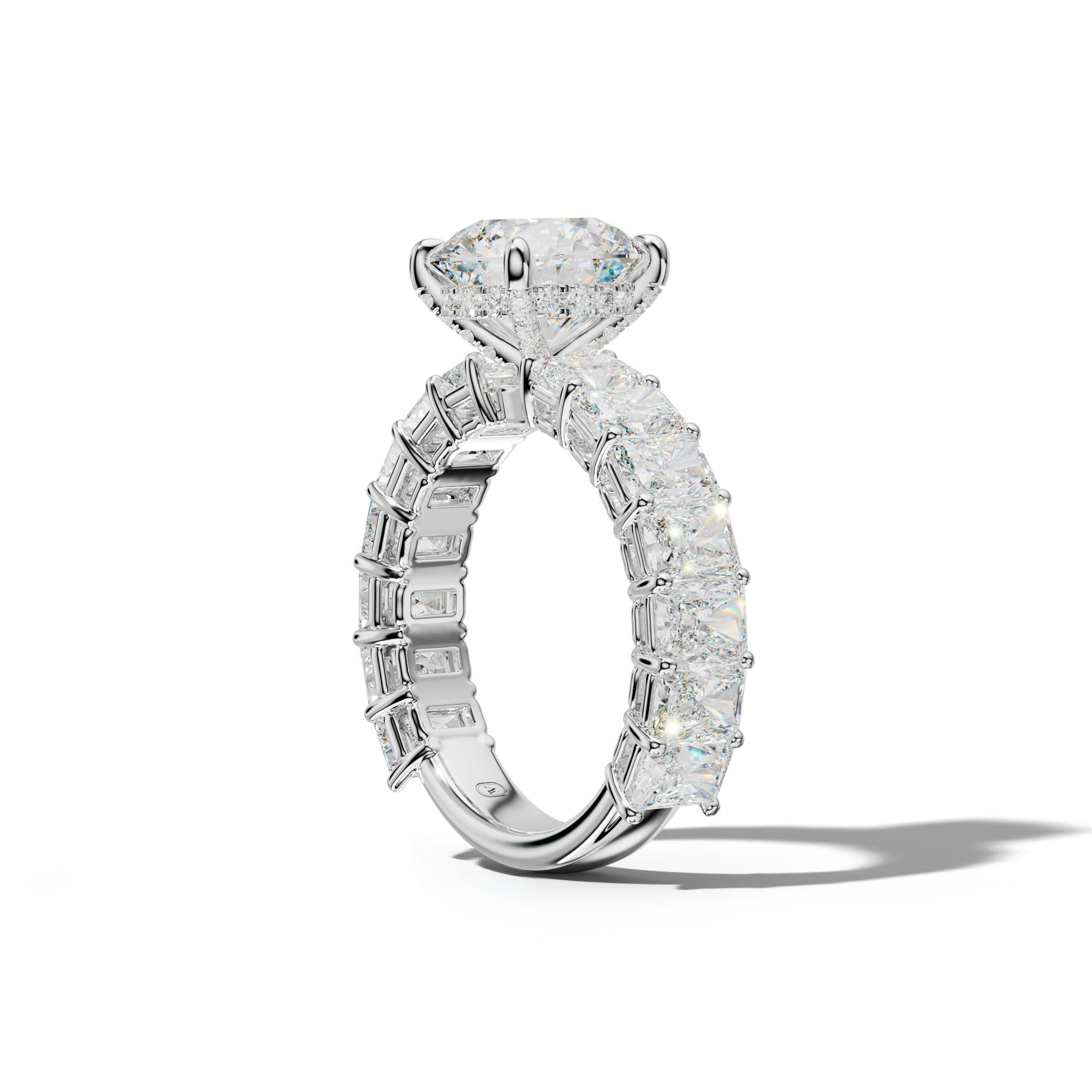 Naomi Round Diamond Engagement Ring With Radiant Side Stones