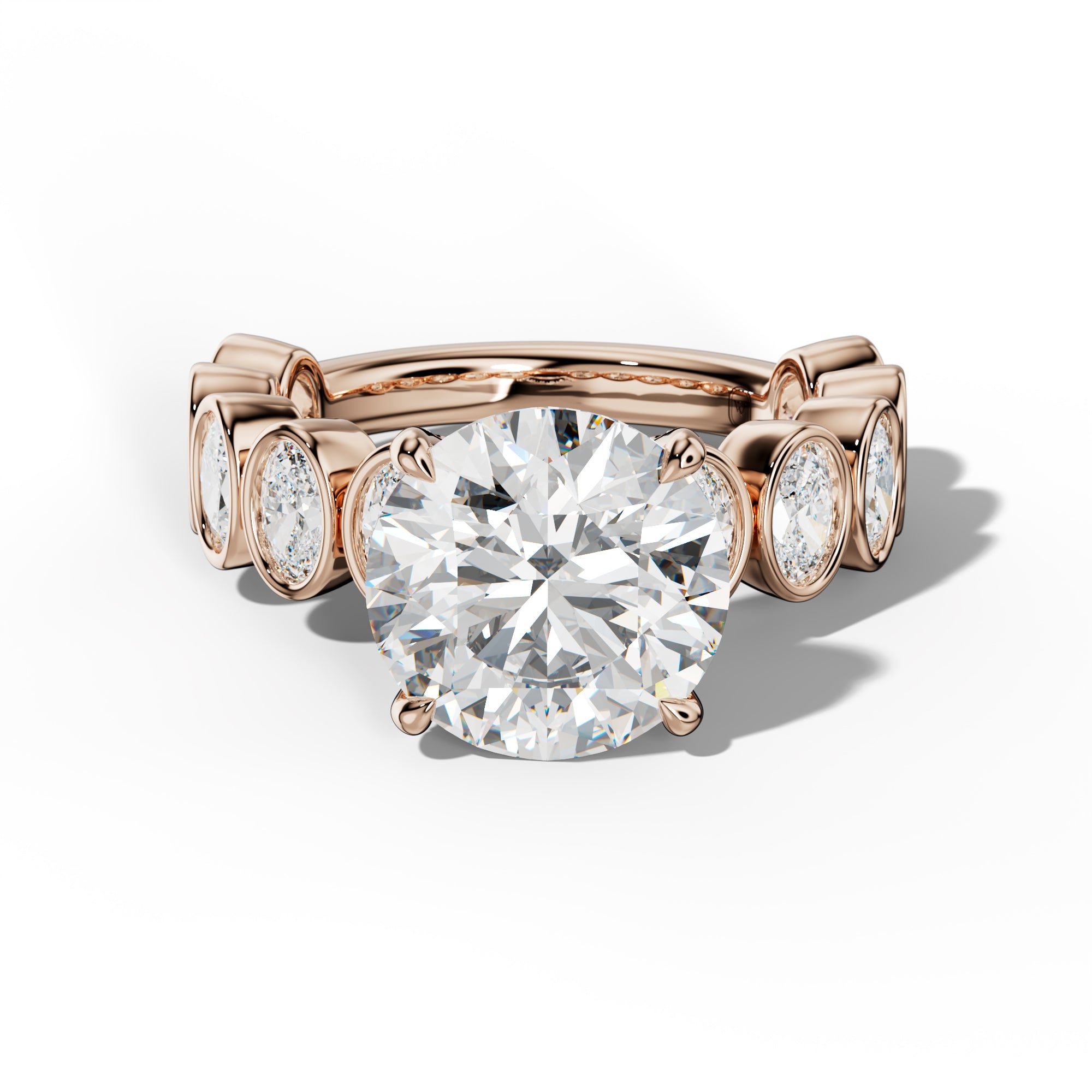 Linda Round Diamond Engagement Ring With Oval Side Stones
