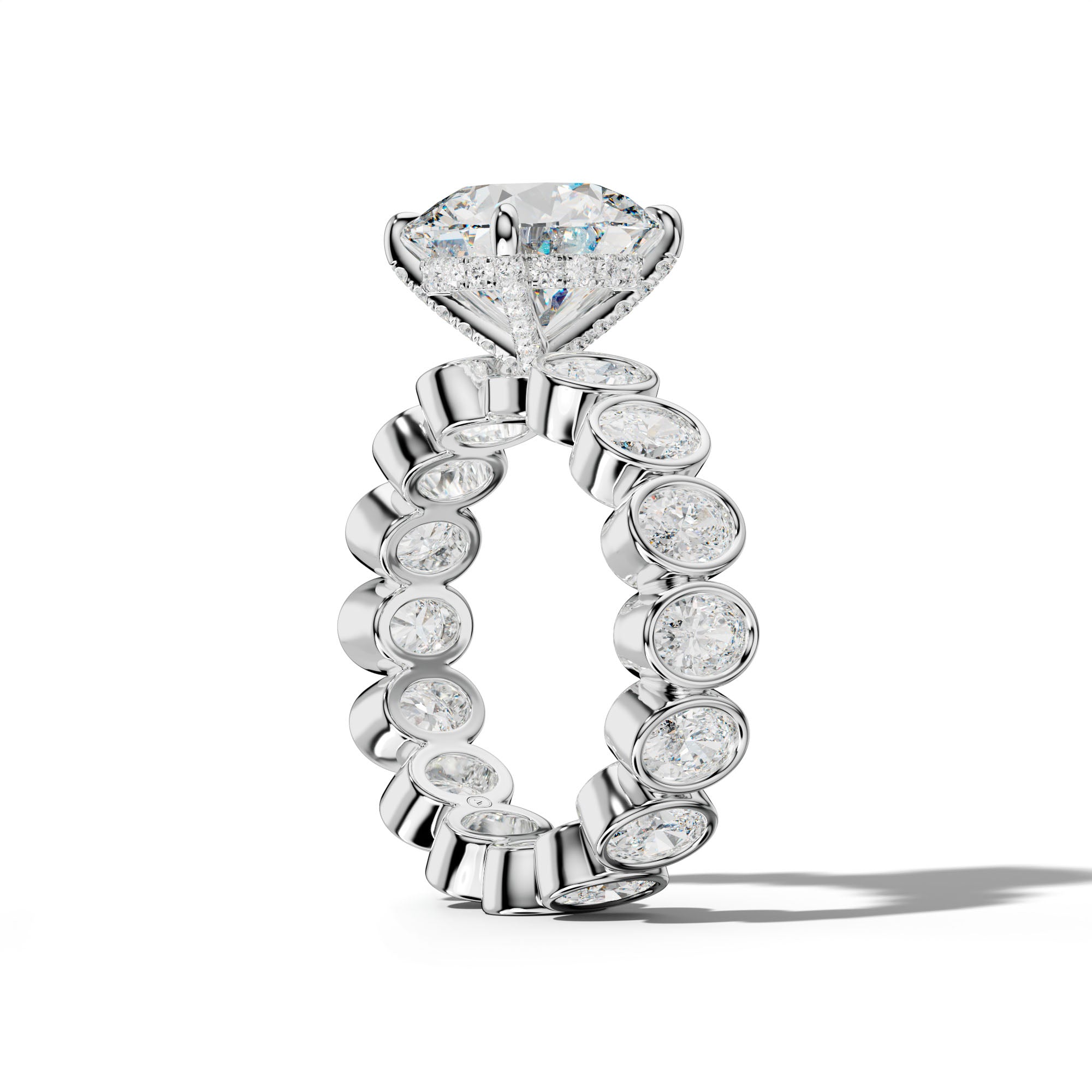 Brielle Round Diamond Engagement Ring With Oval Side Stones