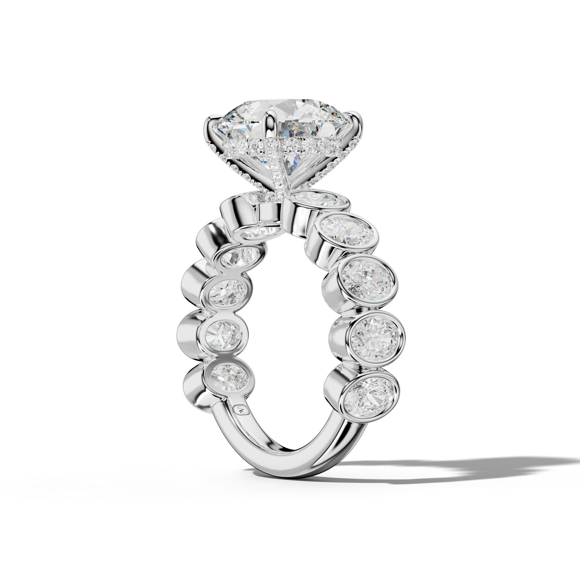 Linda Round Diamond Engagement Ring With Oval Side Stones