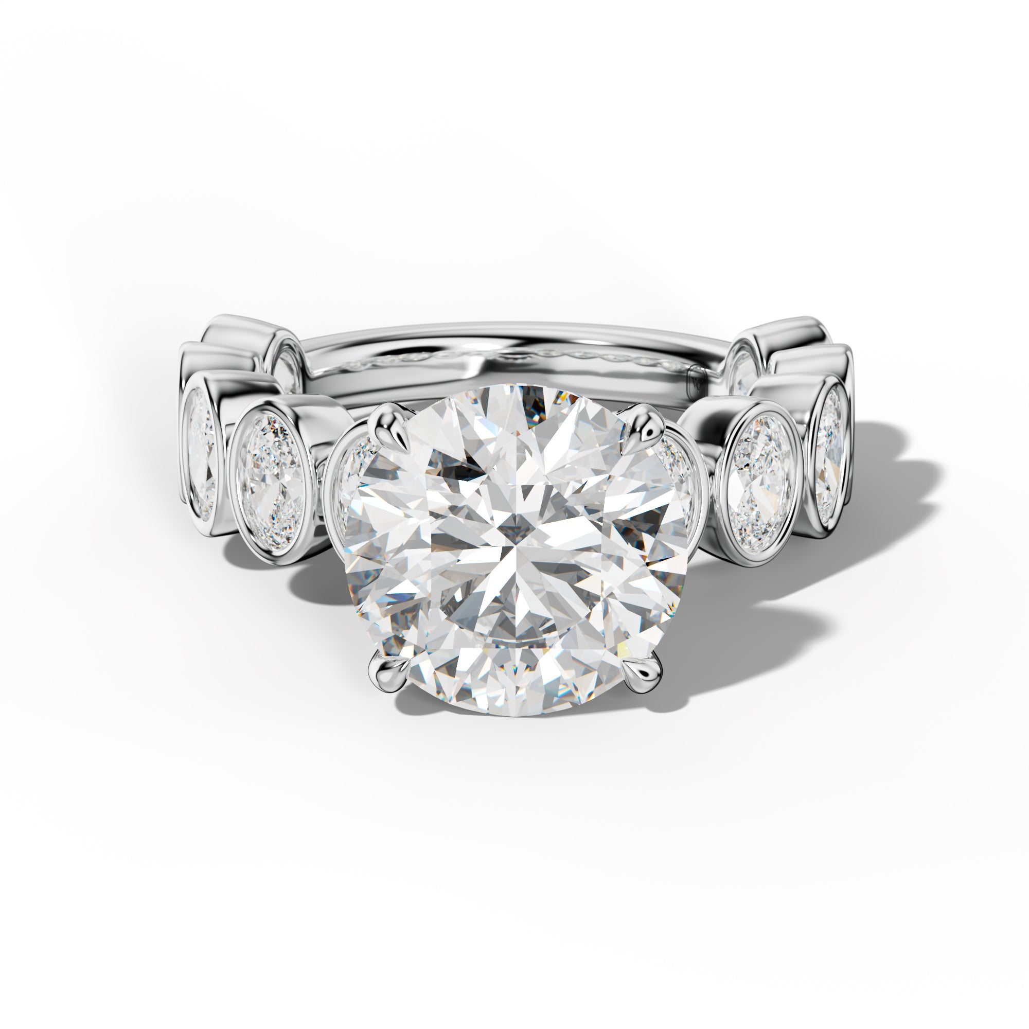 Linda Round Diamond Engagement Ring With Oval Side Stones