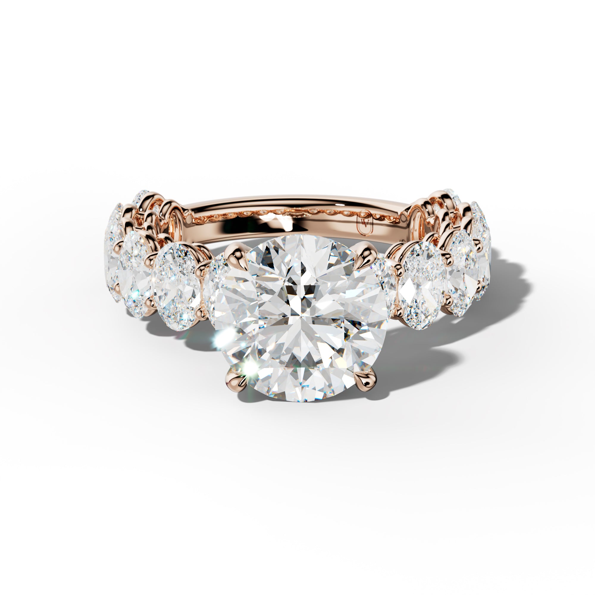 Saylor Round Diamond Engagement Ring With Oval Side Stones