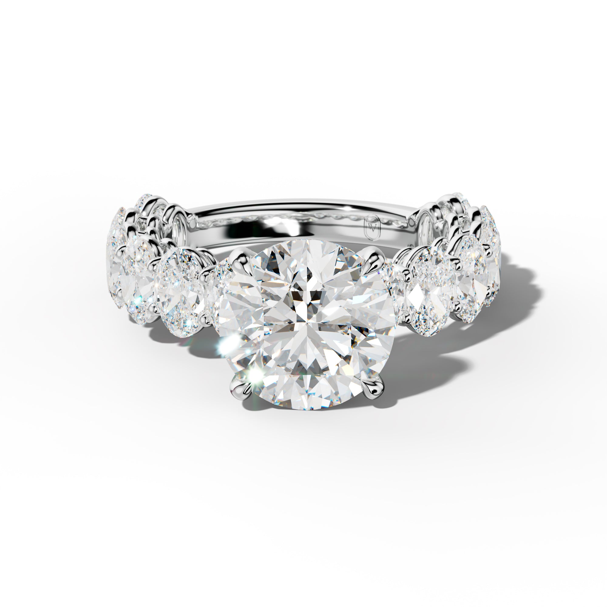 Saylor Round Diamond Engagement Ring With Oval Side Stones