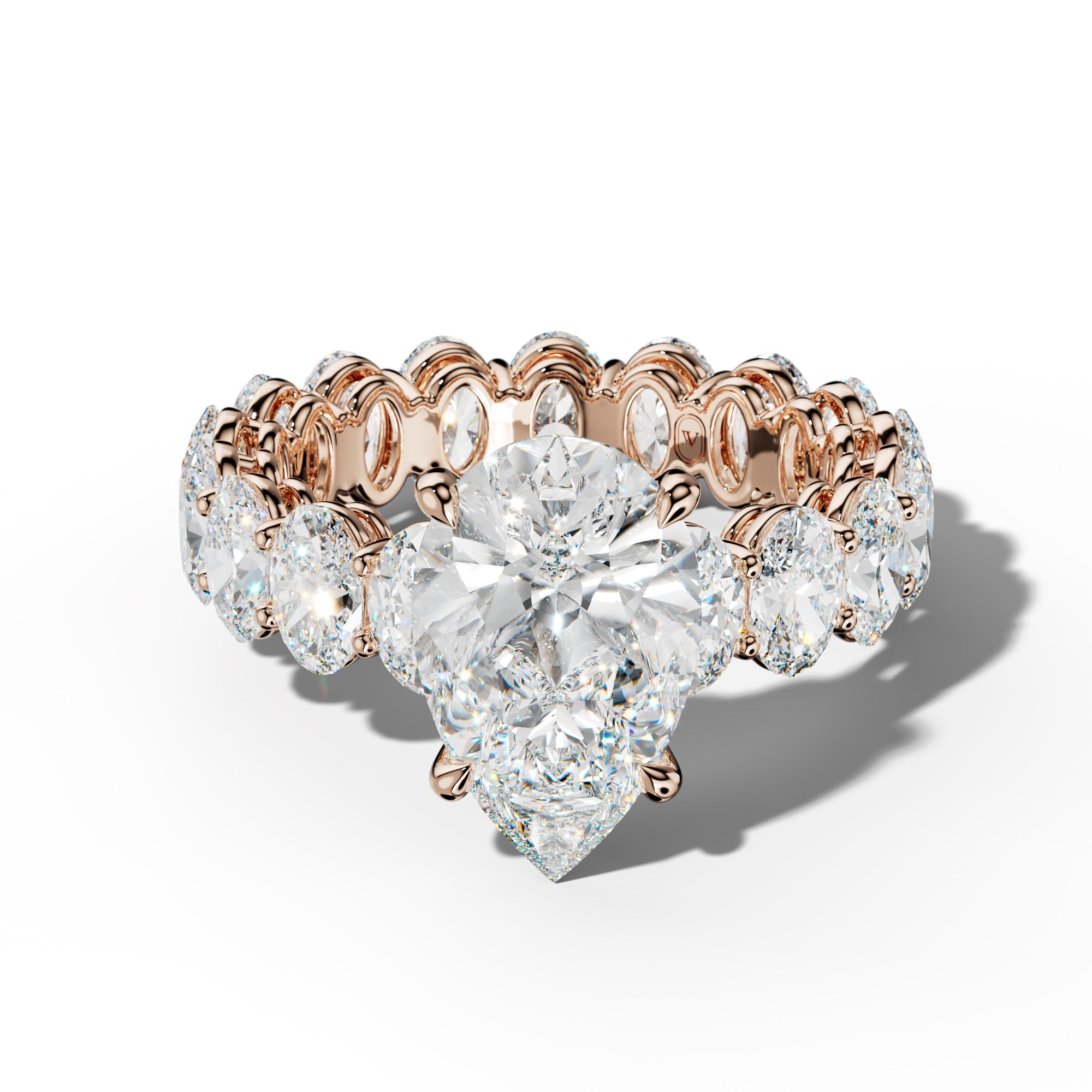 Amoura Pear Shape Engagement Ring With Oval Side Stones
