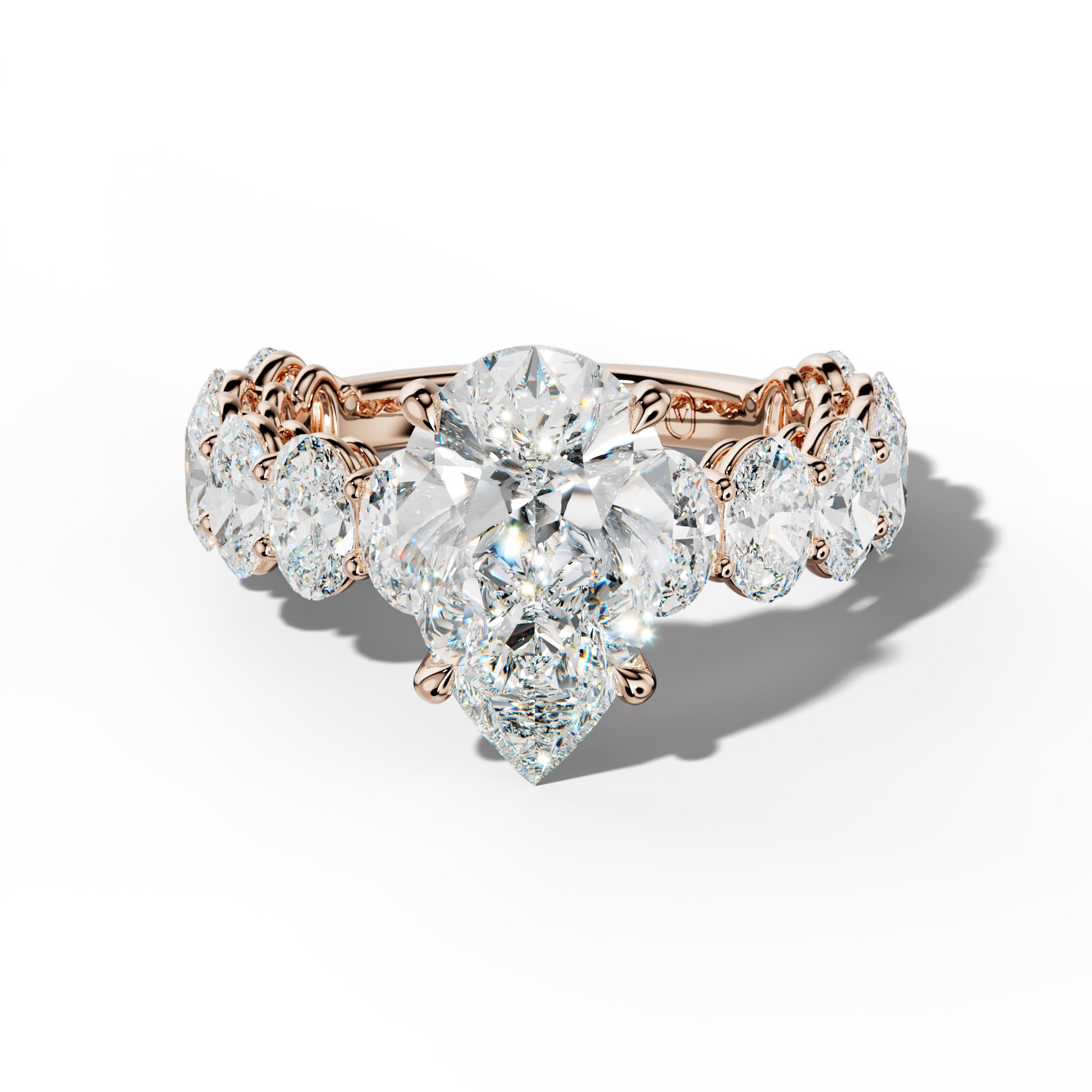 Saylor Pear Shape Engagement Ring With Oval Side Stones