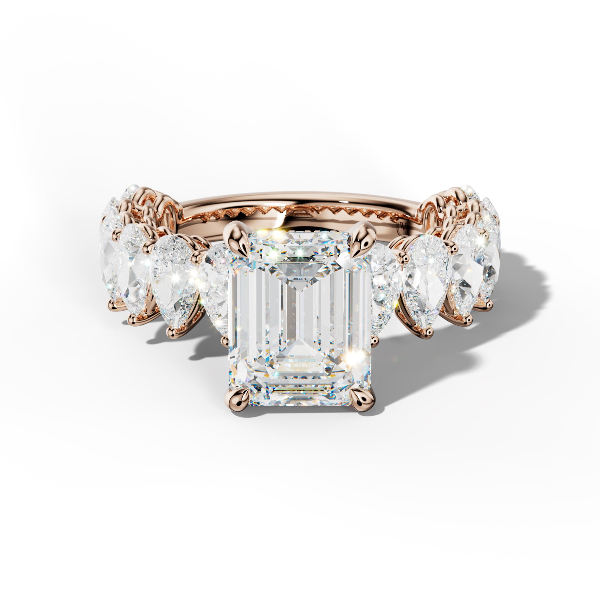 Remi Emerald Cut Diamond Engagement Ring With Pear Shape Side Stones