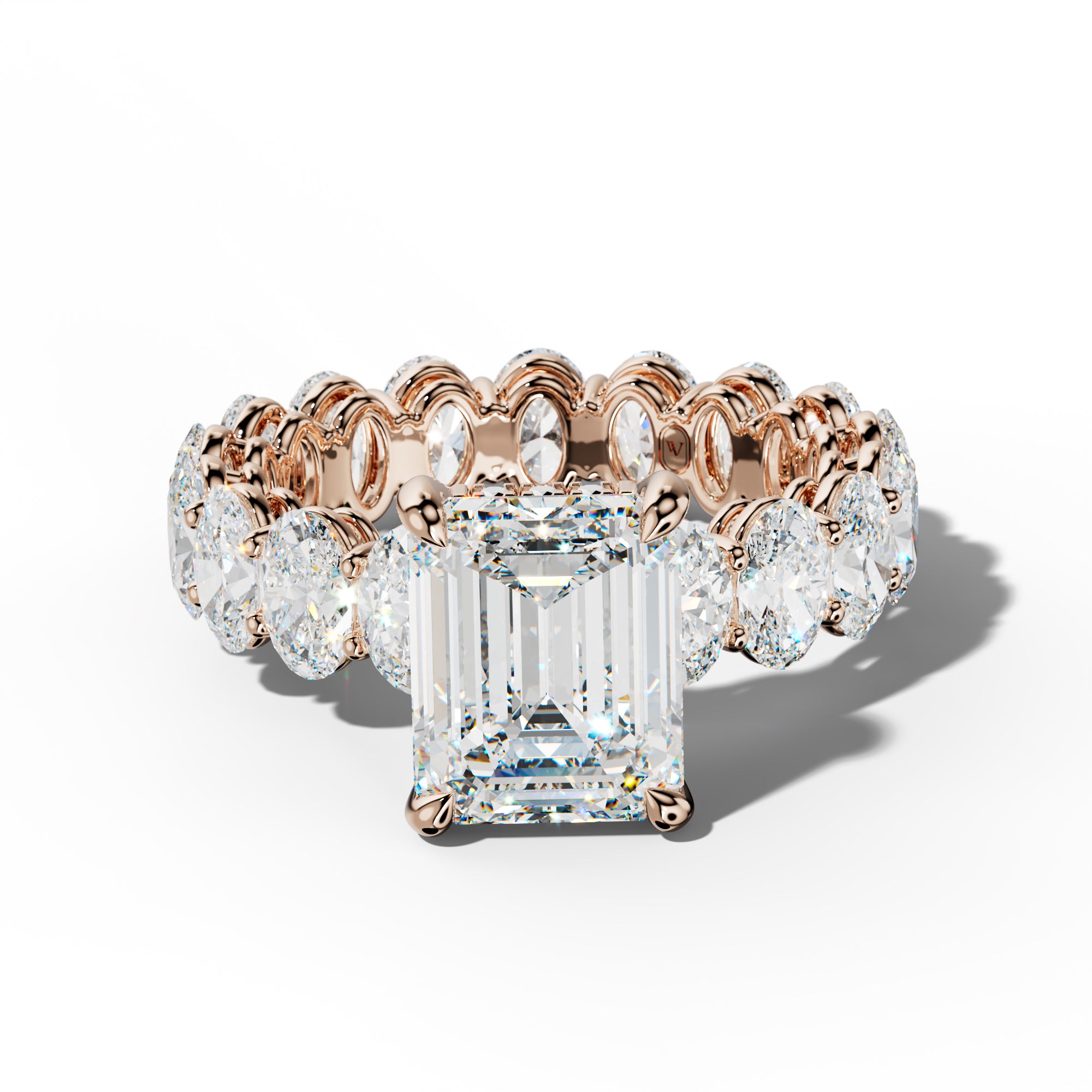 Amoura Emerald Cut Engagement Ring With Oval Side Stones
