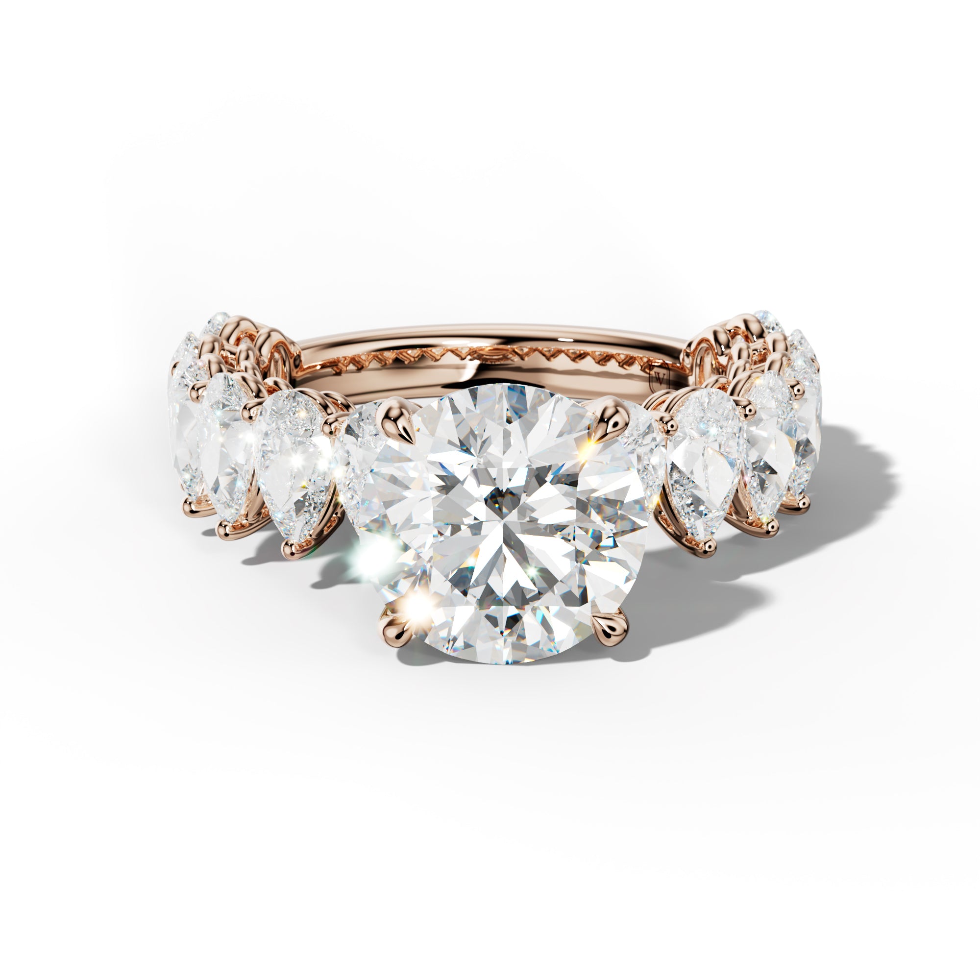 Remi Round Diamond Engagement Ring With Pear Shape Side Stones