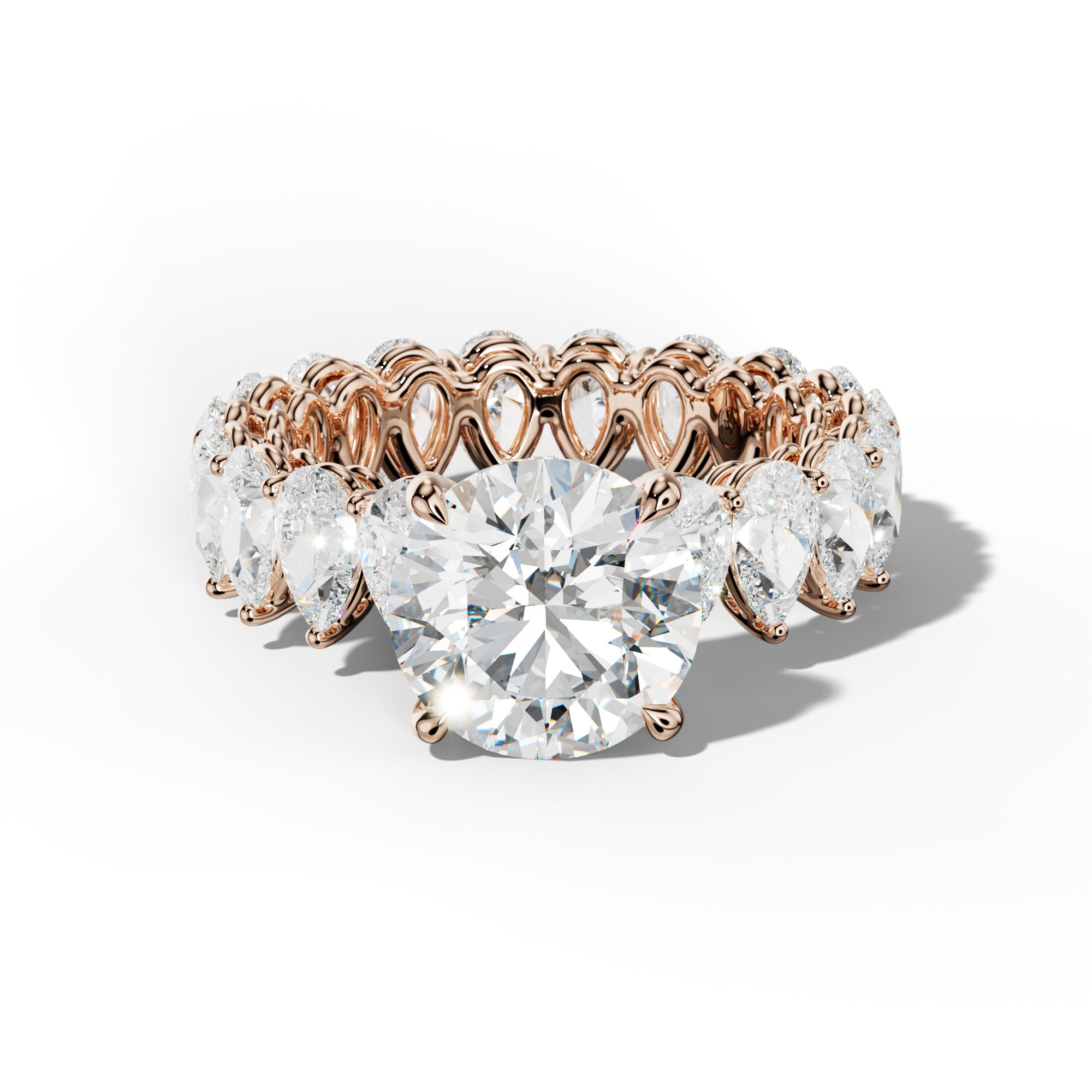 Maya Round Diamond Engagement Ring With Pear Shape Side Stones