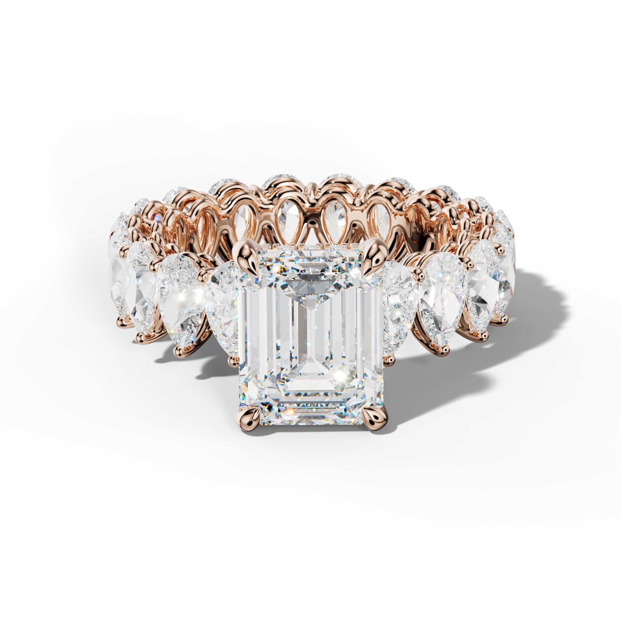 Maya Emerald Cut Diamond Engagement Ring With Pear Shape Side Stones