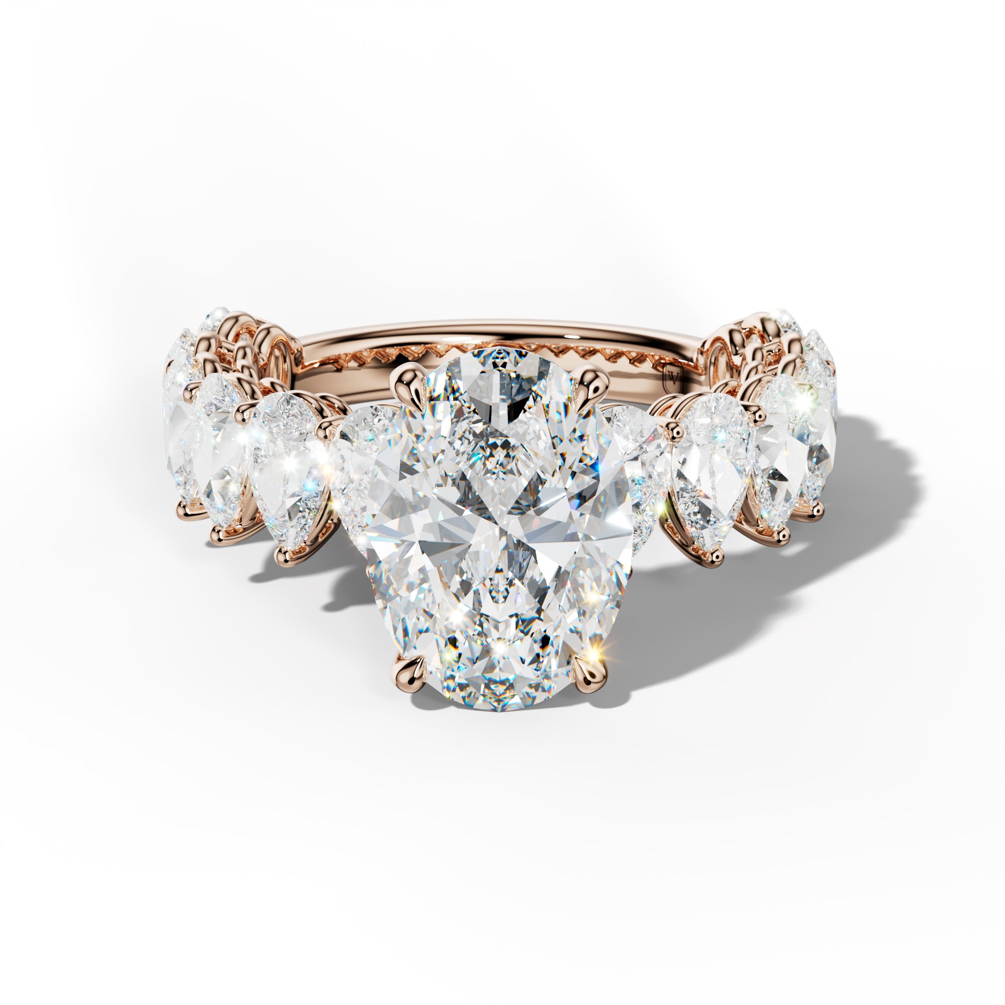 Remi Oval Diamond Engagement Ring With Pear Shape Side Stones
