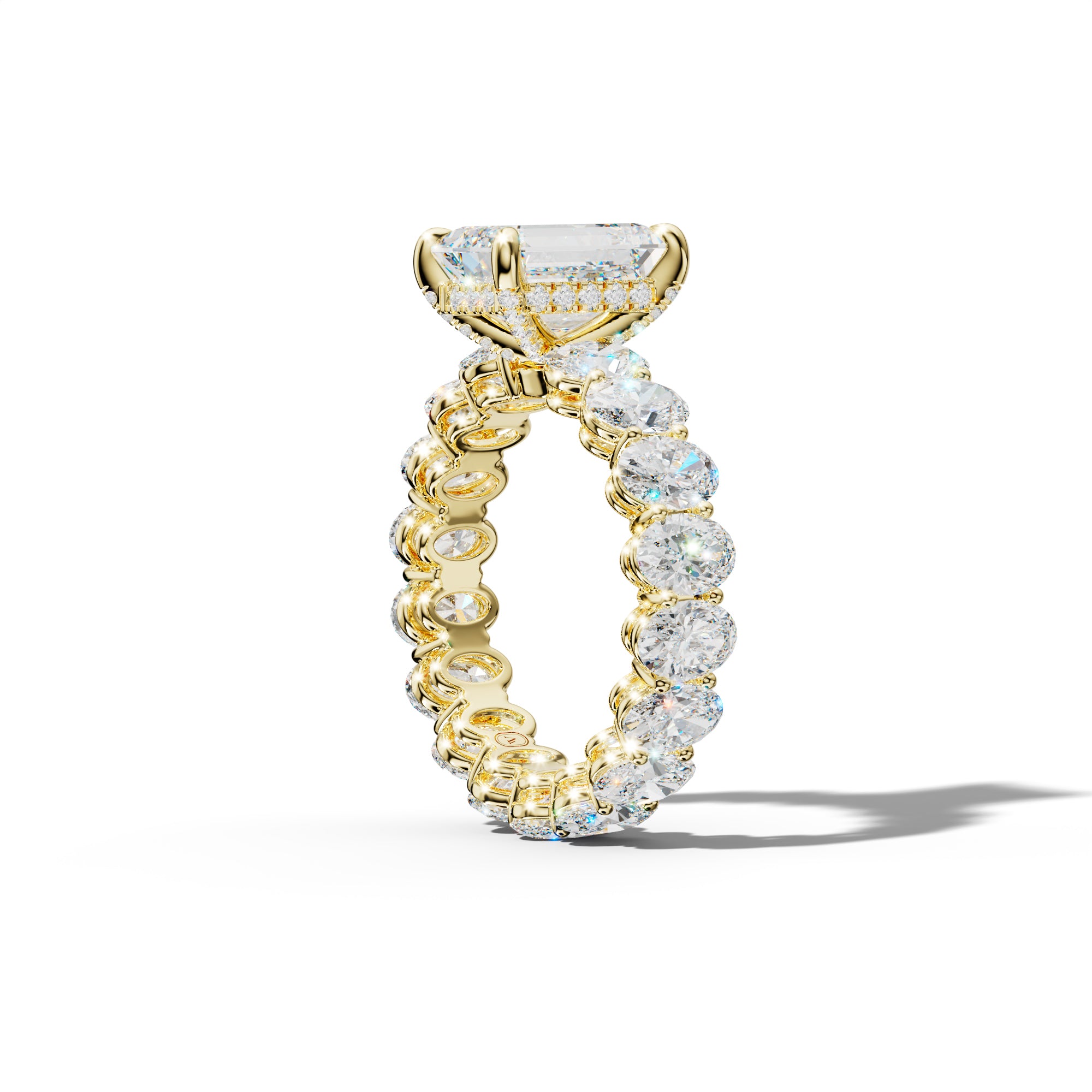 Amoura Emerald Cut Engagement Ring With Oval Side Stones