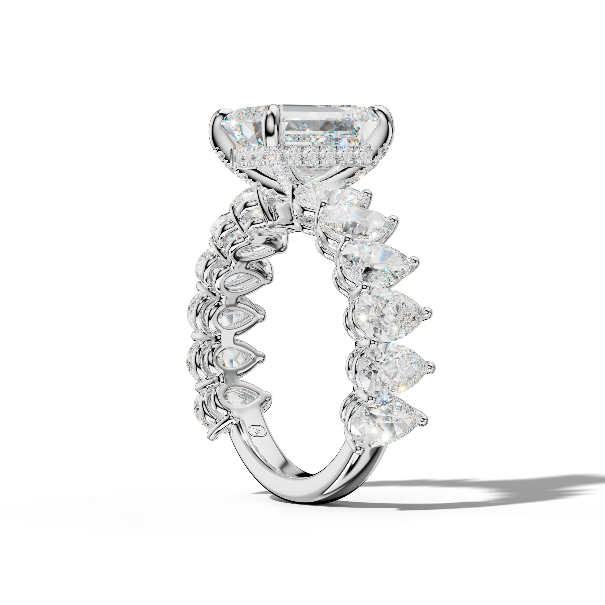 Remi Emerald Cut Diamond Engagement Ring With Pear Shape Side Stones