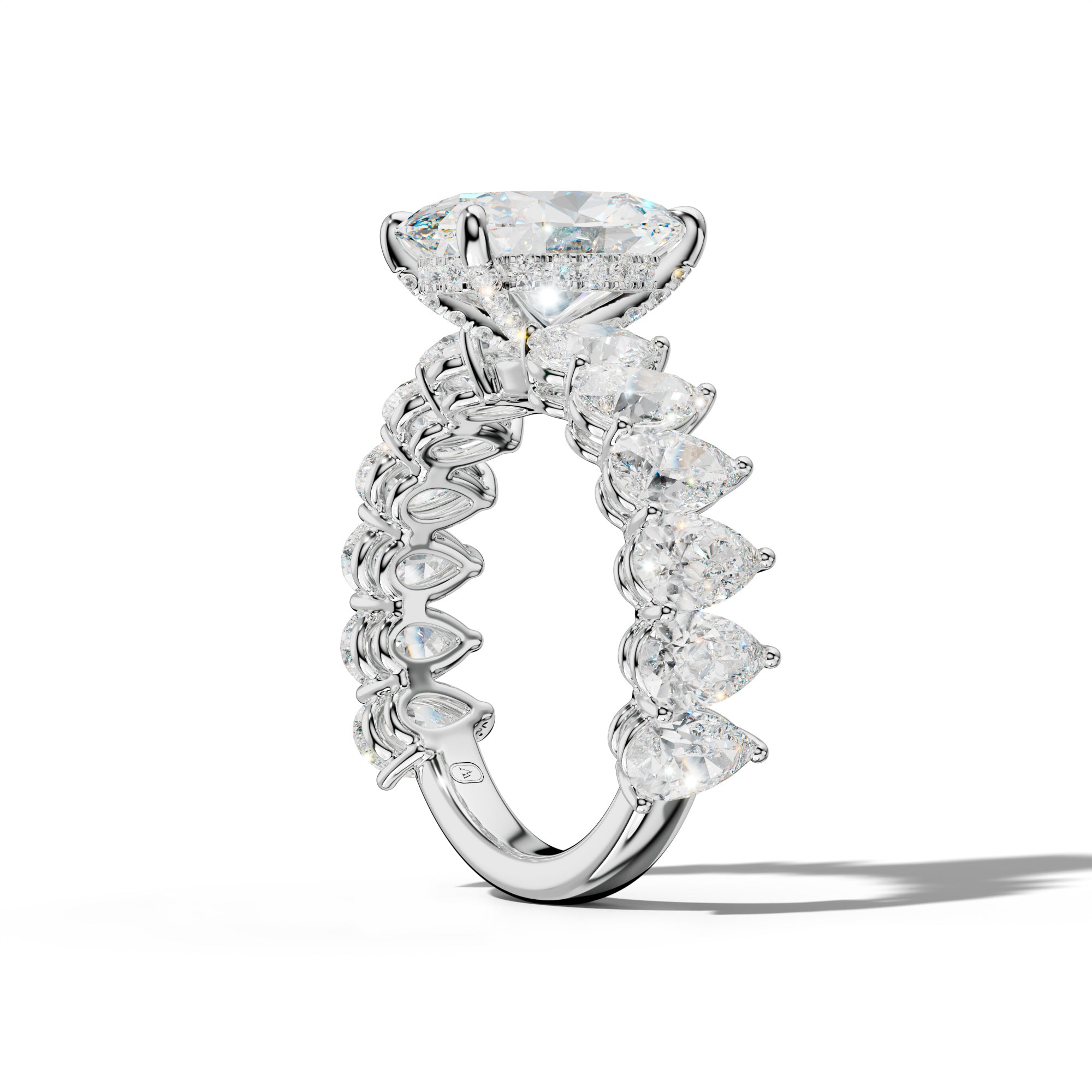 Remi Oval Diamond Engagement Ring With Pear Shape Side Stones
