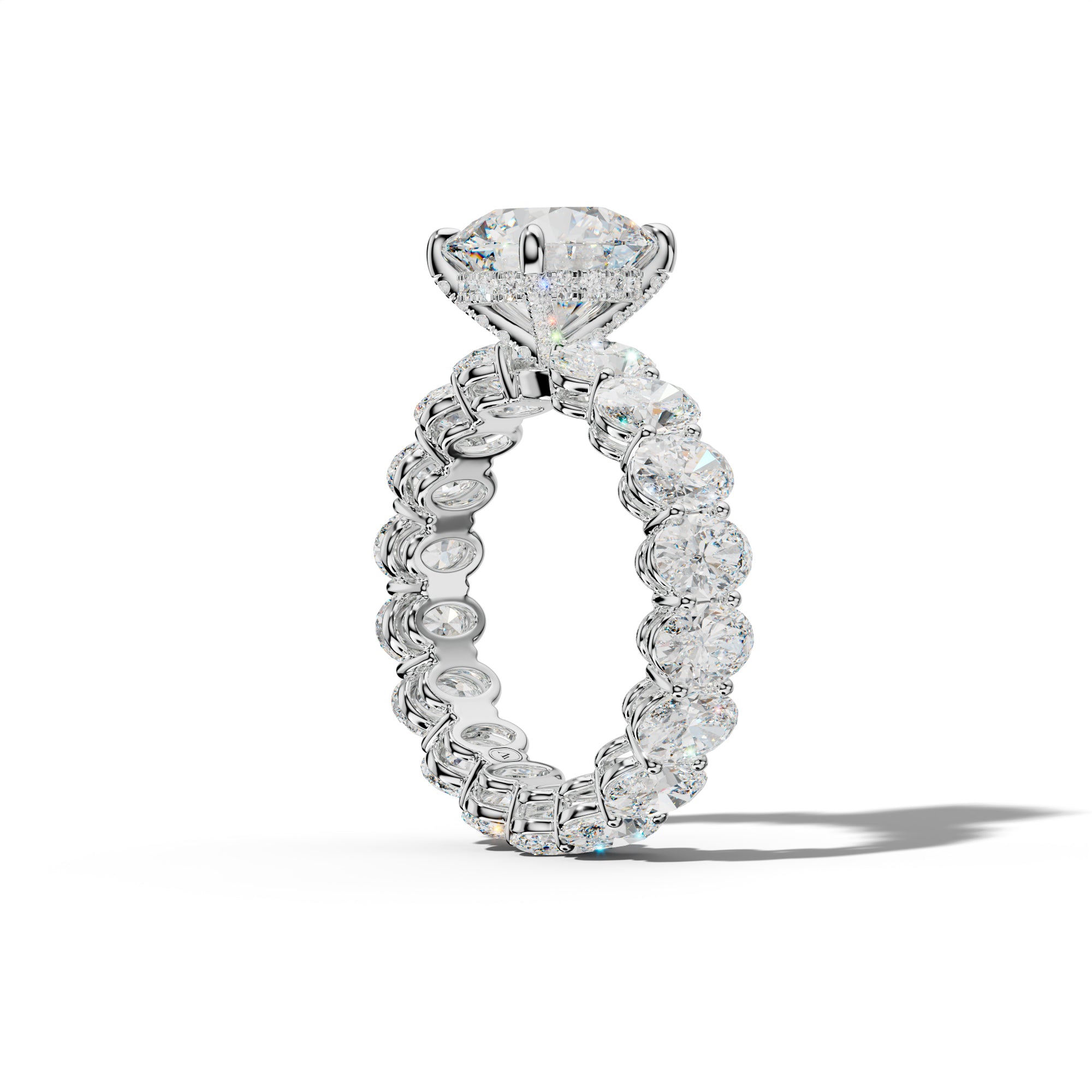 Amoura Round Diamond Engagement Ring With Oval Side Stones