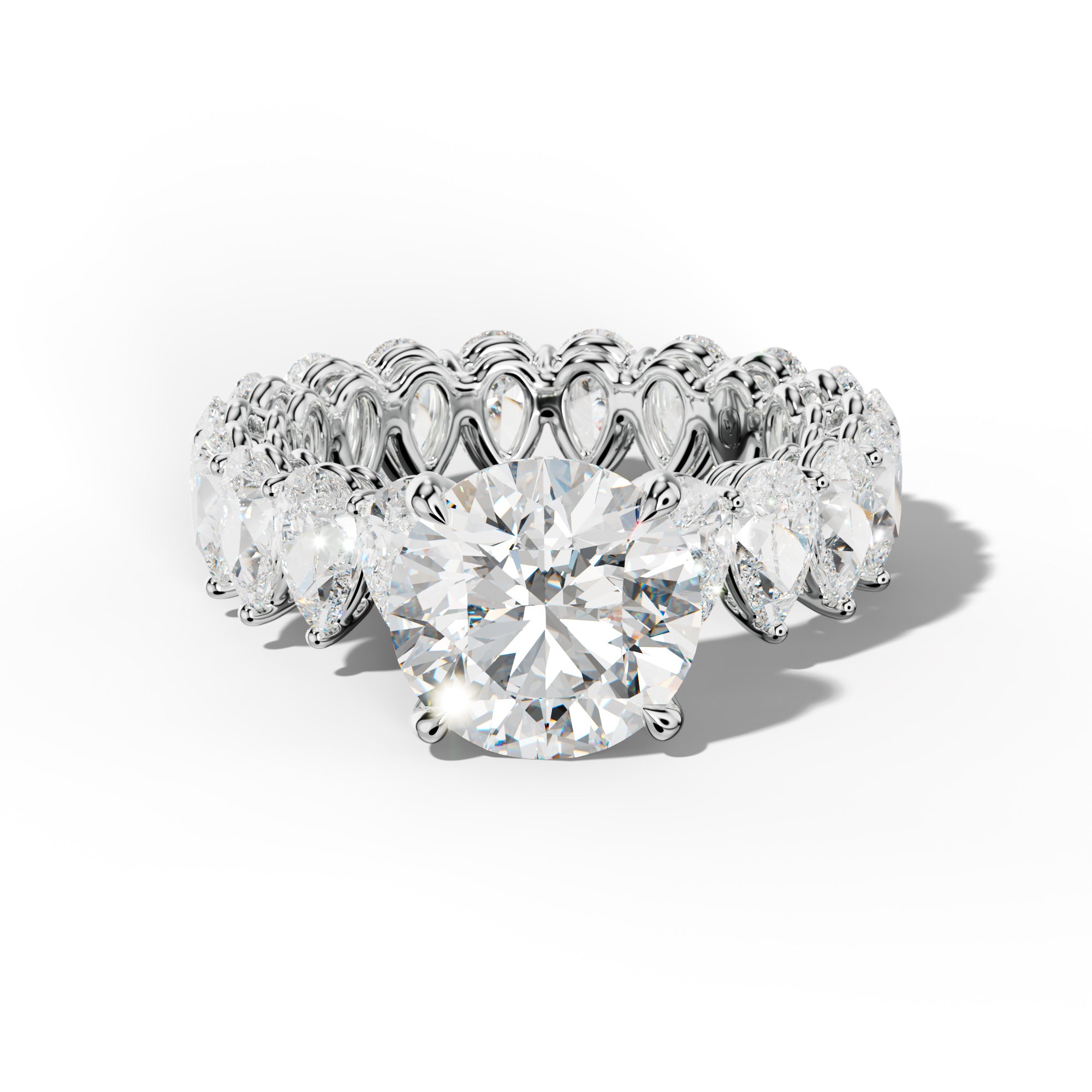 Maya Round Diamond Engagement Ring With Pear Shape Side Stones