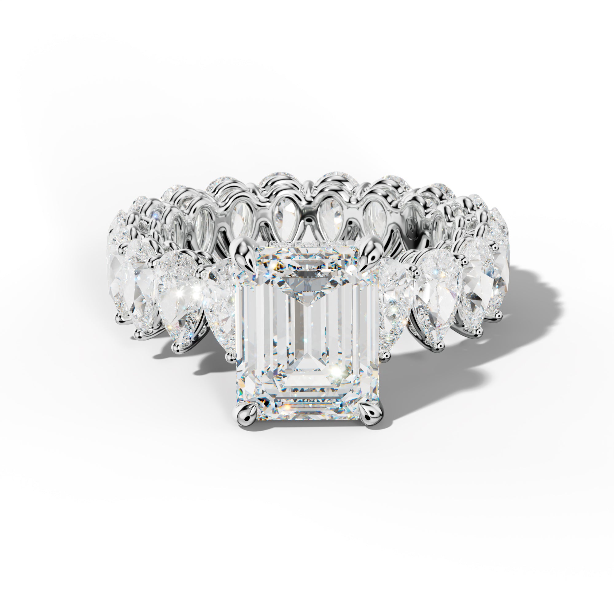 Maya Emerald Cut Diamond Engagement Ring With Pear Shape Side Stones