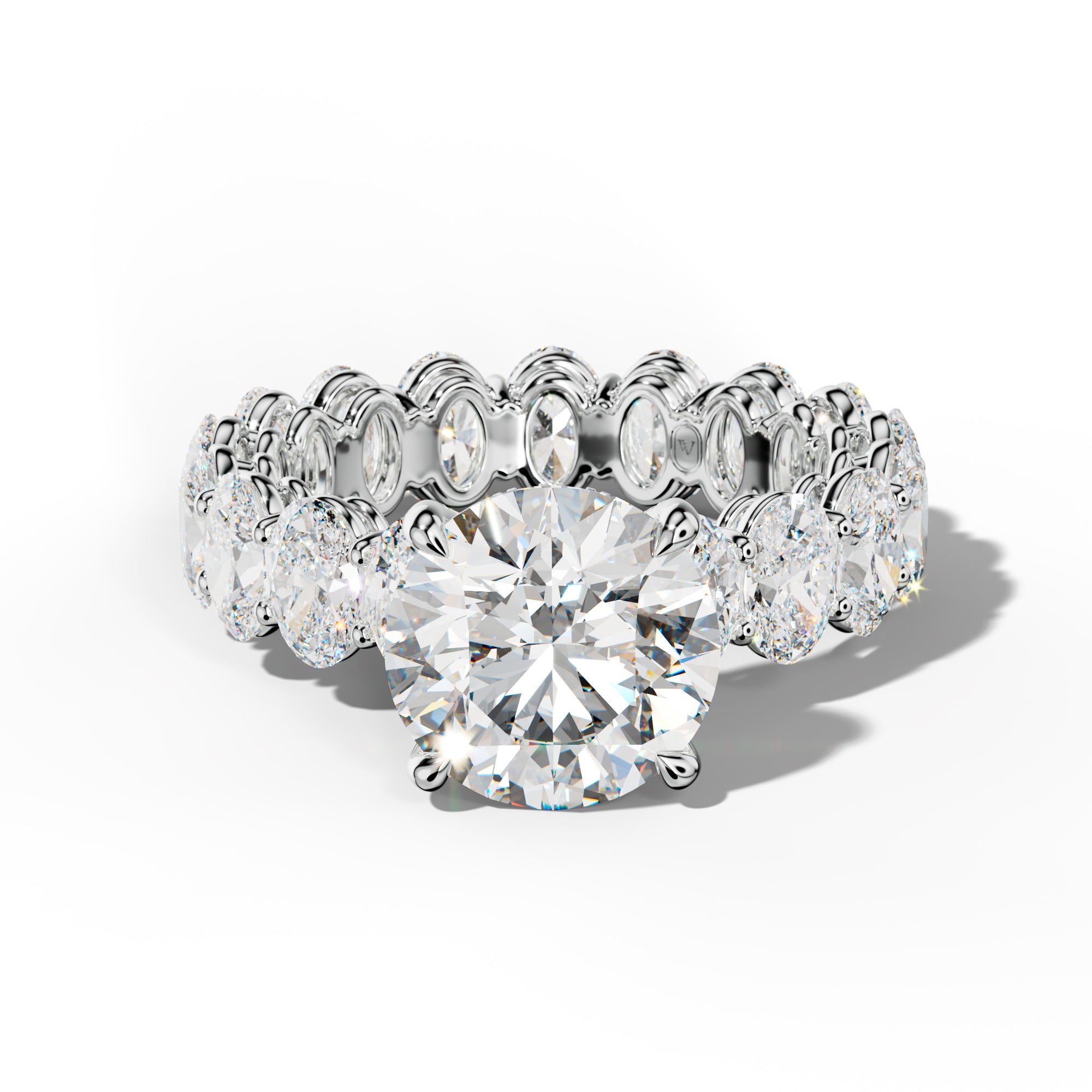 Amoura Round Diamond Engagement Ring With Oval Side Stones