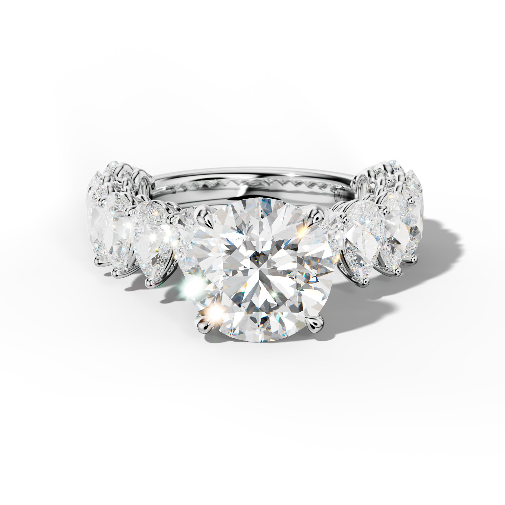 Remi Round Diamond Engagement Ring With Pear Shape Side Stones