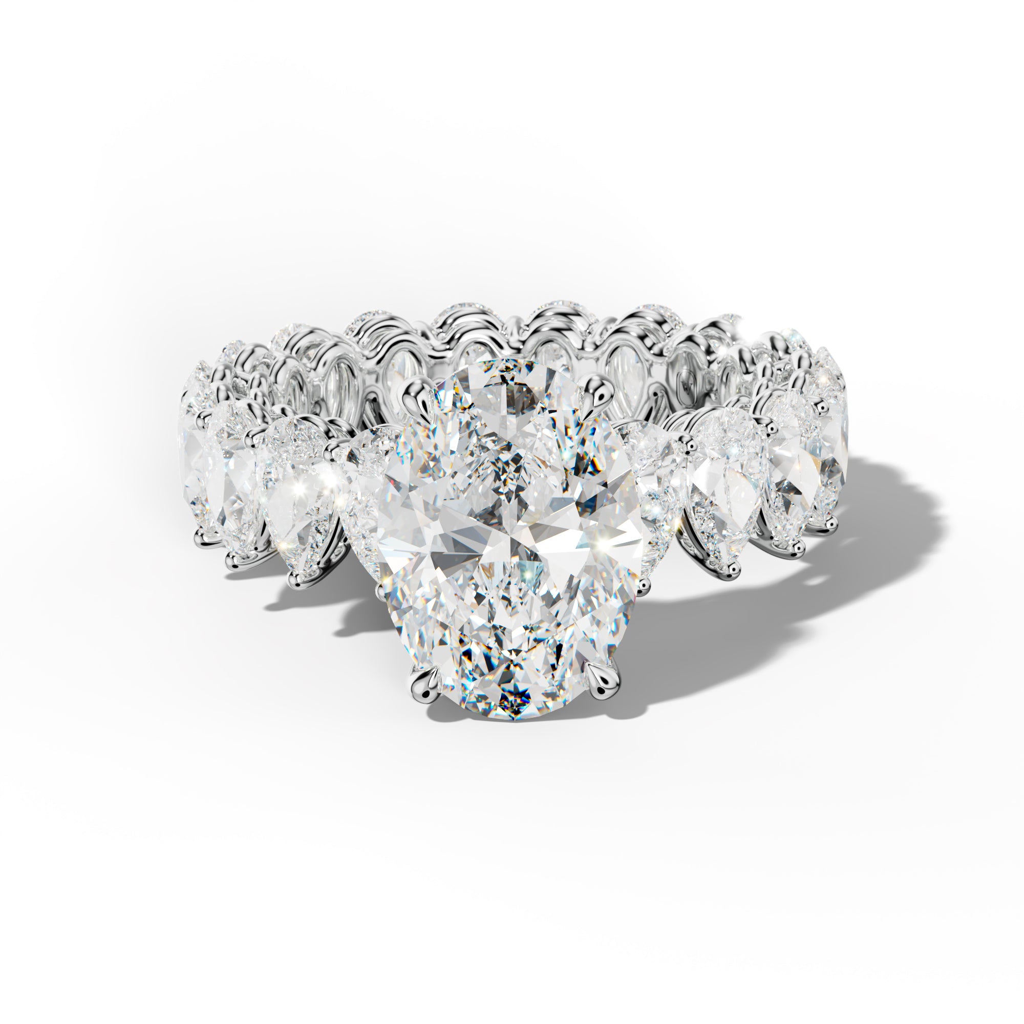 Maya Oval Diamond Engagement Ring With Pear Shape Side Stones