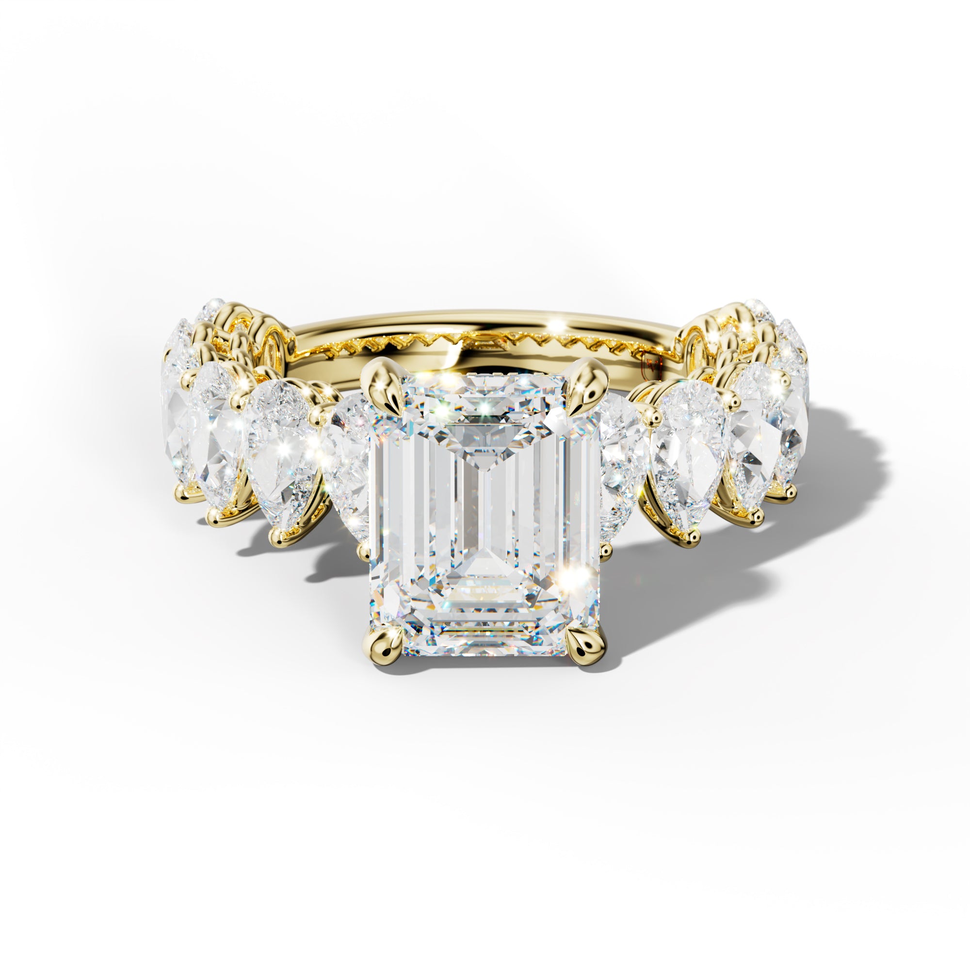 Remi Emerald Cut Diamond Engagement Ring With Pear Shape Side Stones