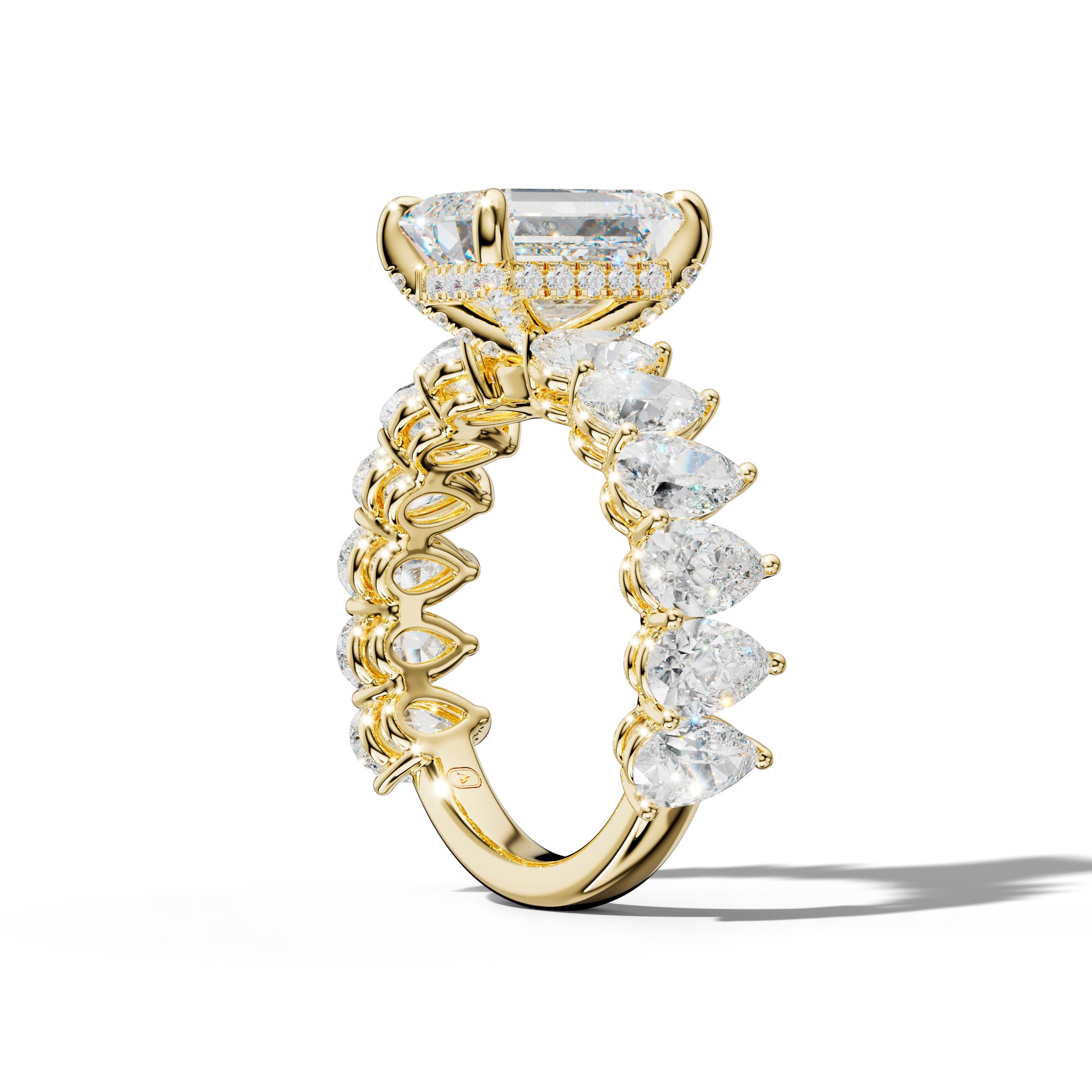 Remi Emerald Cut Diamond Engagement Ring With Pear Shape Side Stones