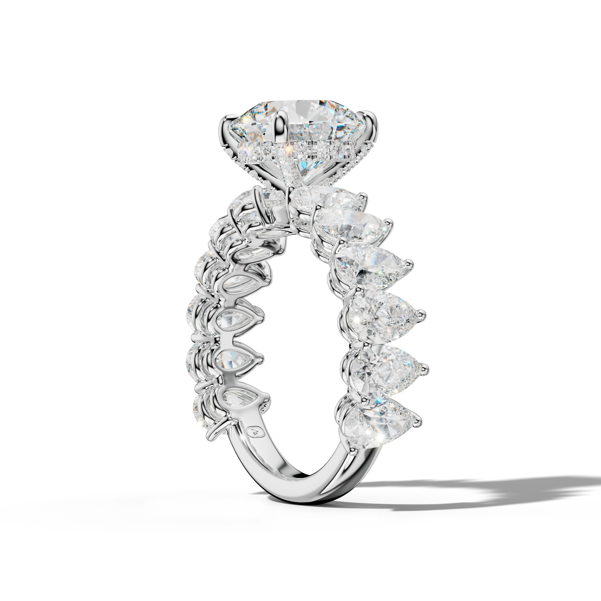 Remi Round Diamond Engagement Ring With Pear Shape Side Stones