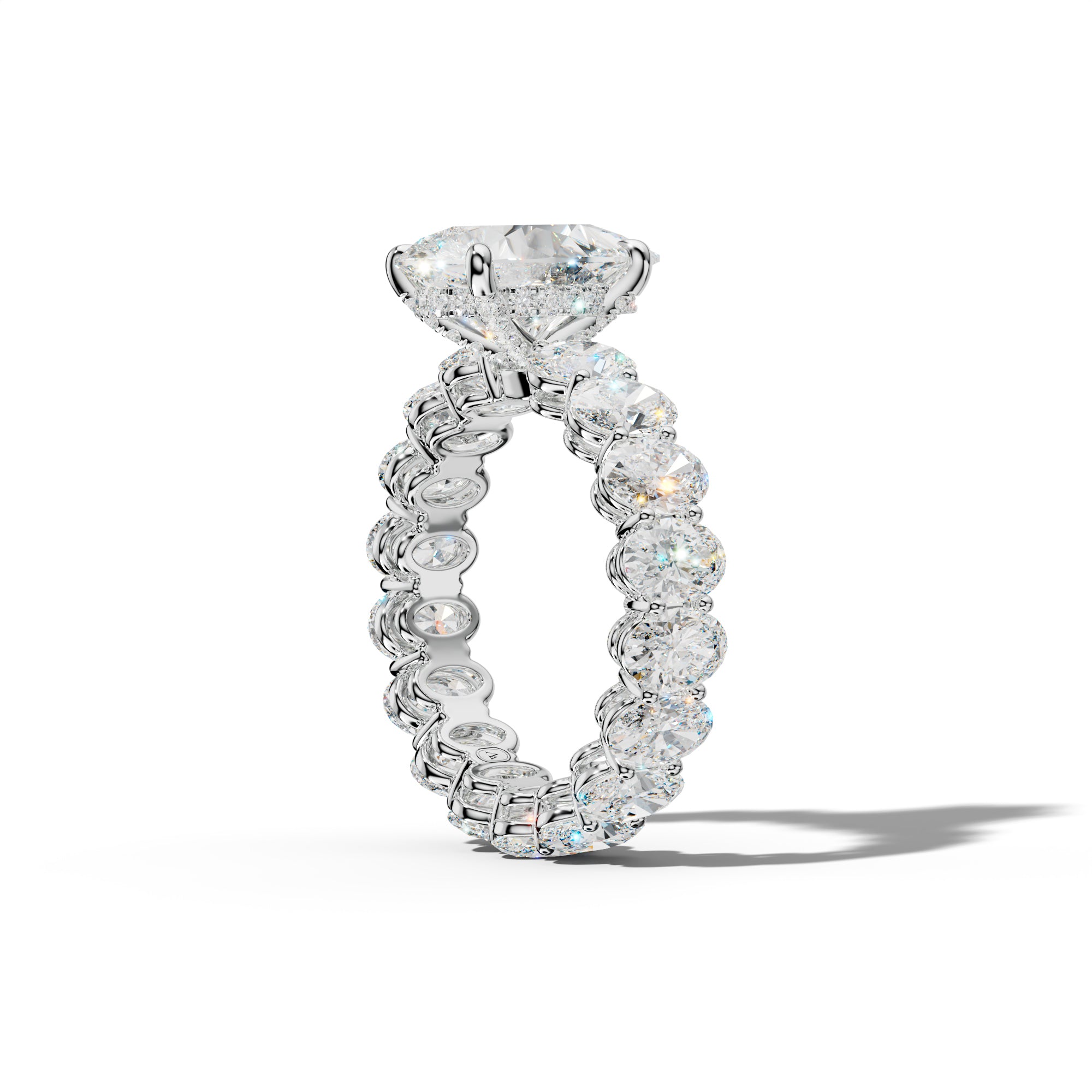 Amoura Pear Shape Engagement Ring With Oval Side Stones