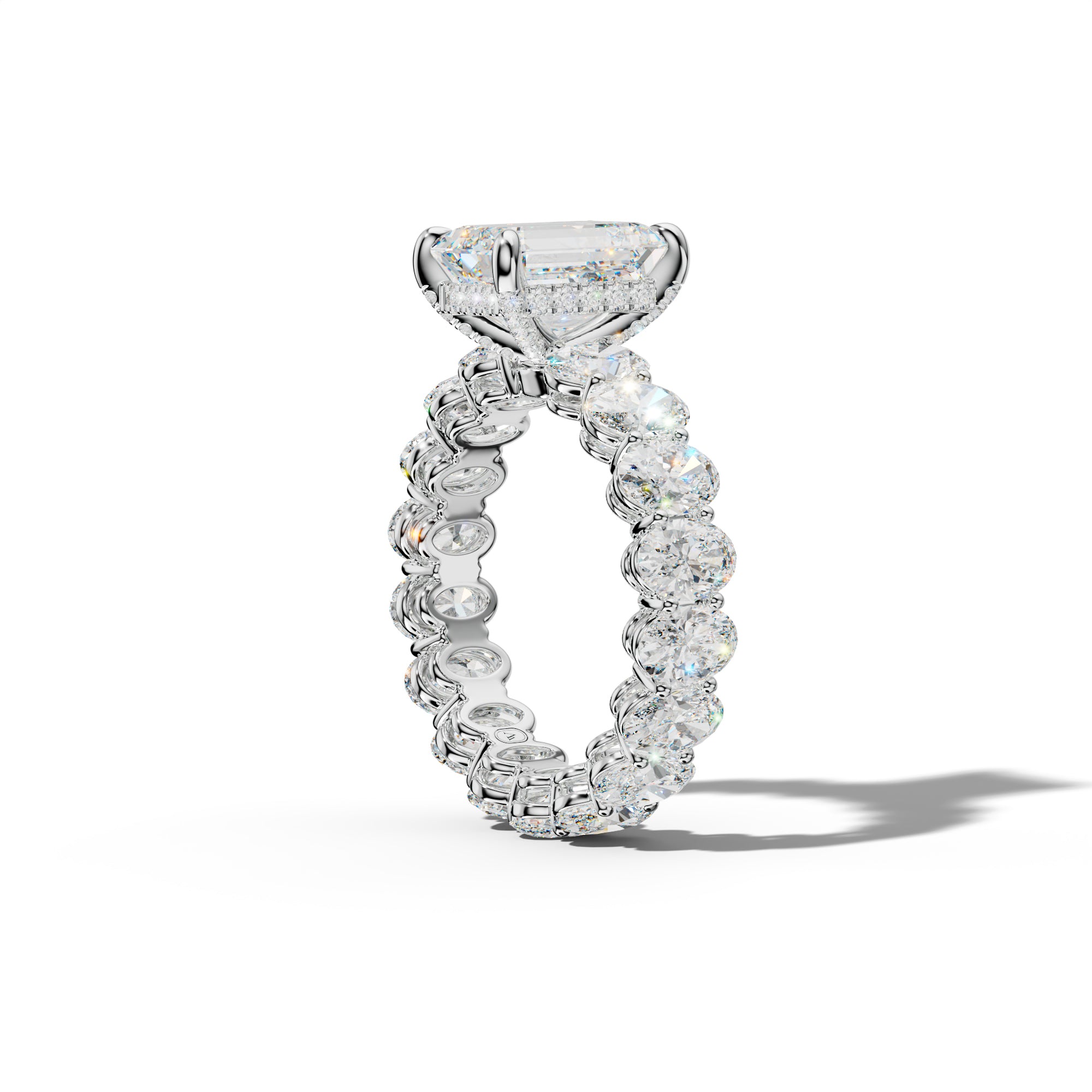 Amoura Emerald Cut Engagement Ring With Oval Side Stones