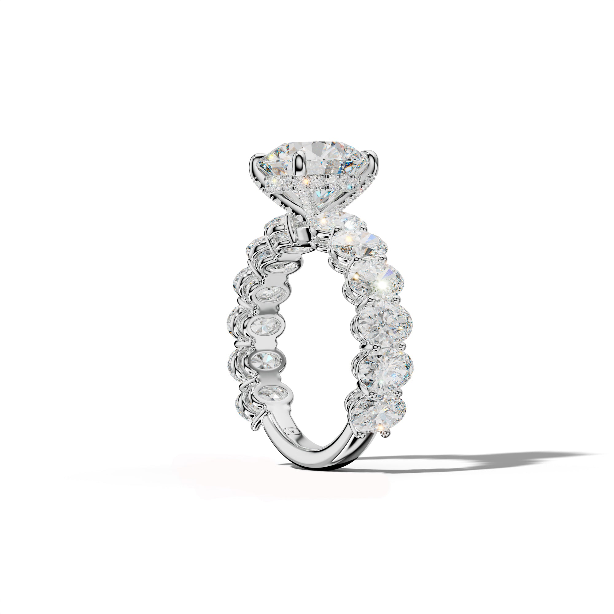 Saylor Round Diamond Engagement Ring With Oval Side Stones