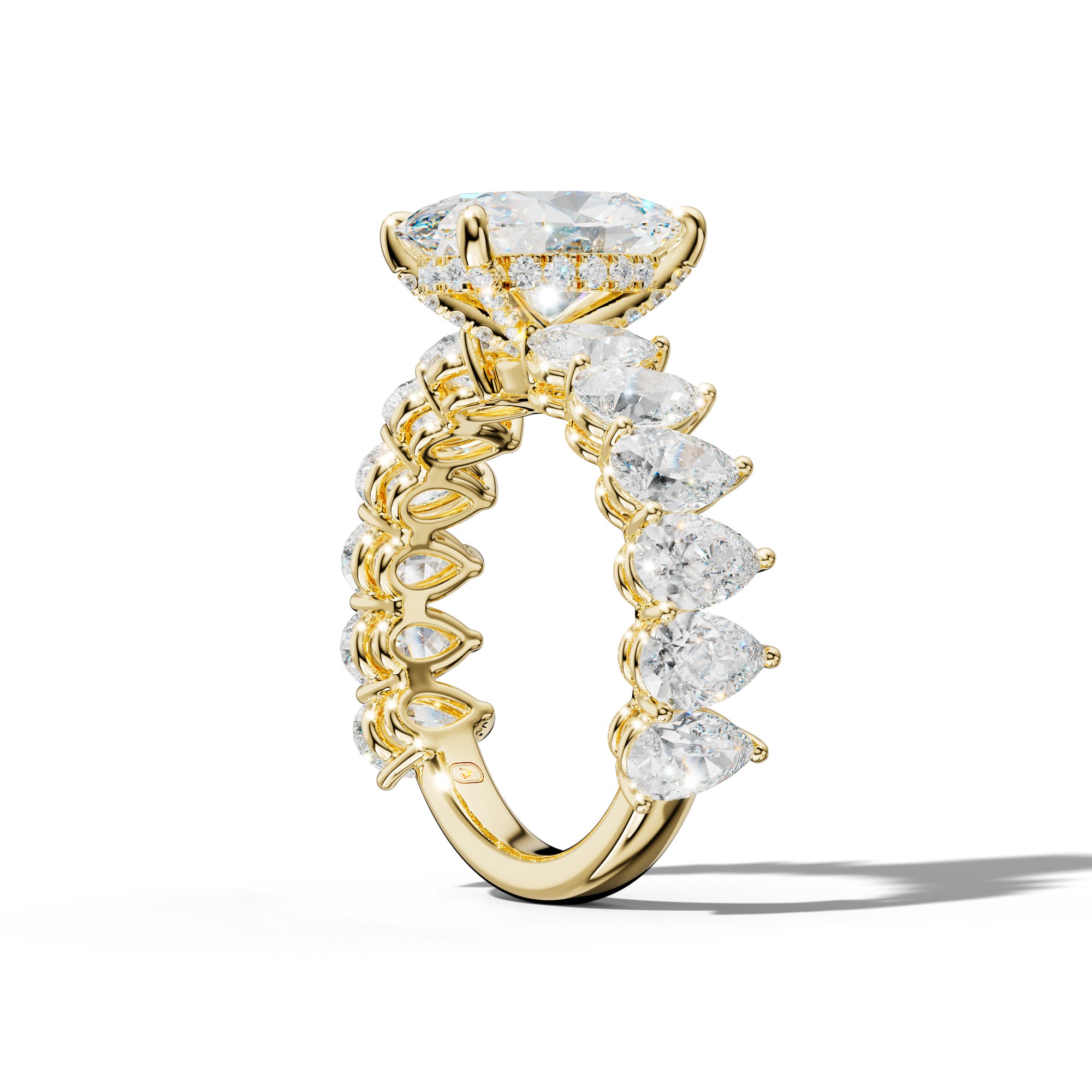 Remi Oval Diamond Engagement Ring With Pear Shape Side Stones