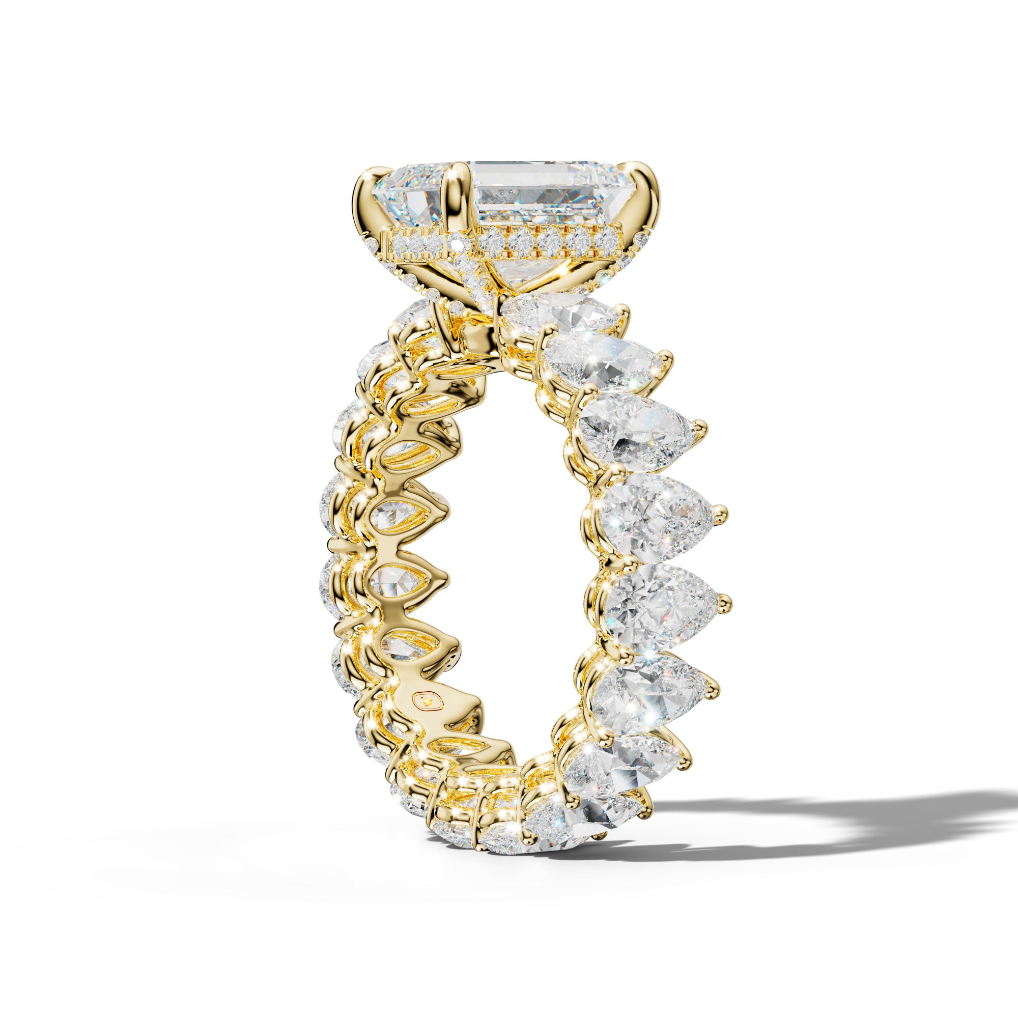 Maya Emerald Cut Diamond Engagement Ring With Pear Shape Side Stones