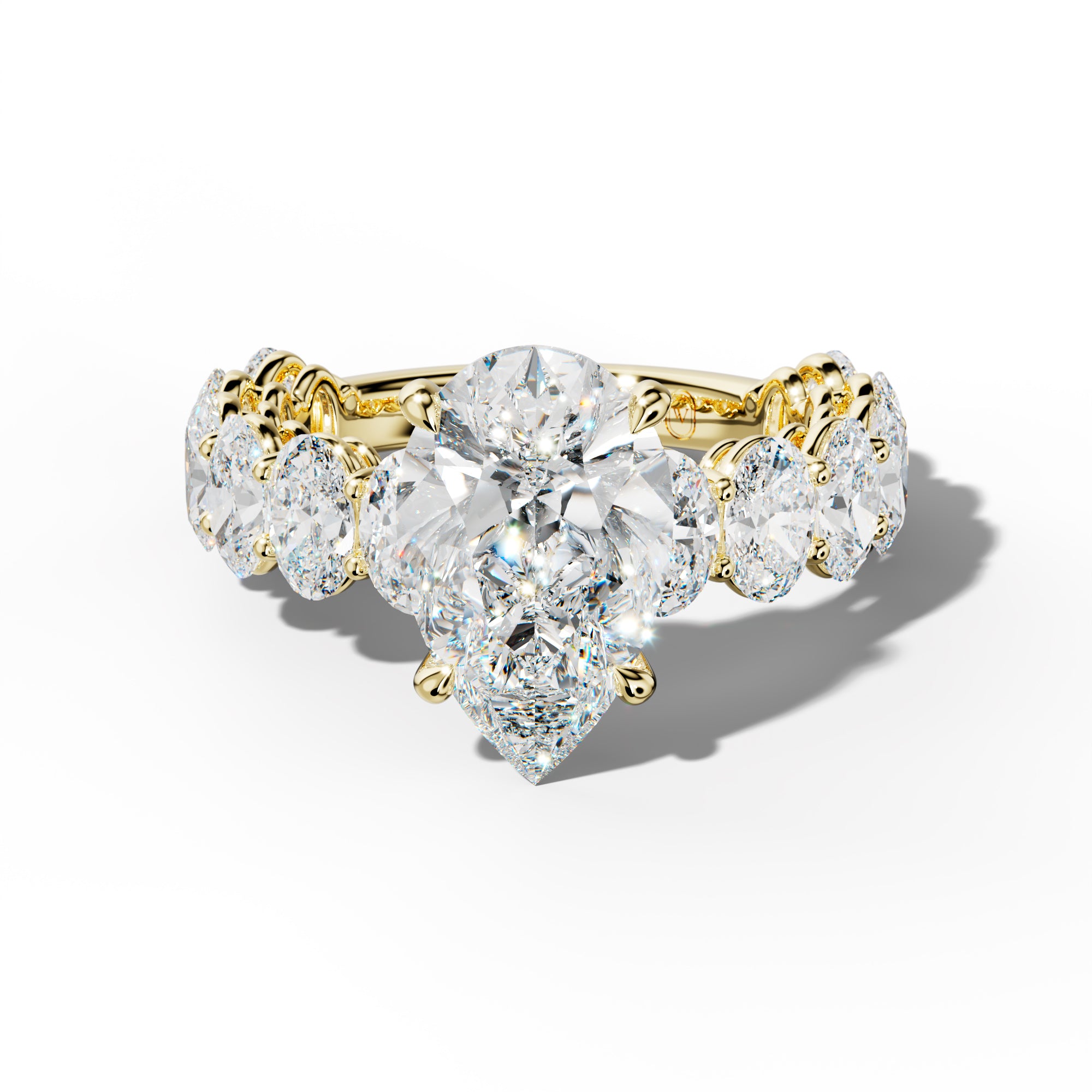 Saylor Pear Shape Engagement Ring With Oval Side Stones