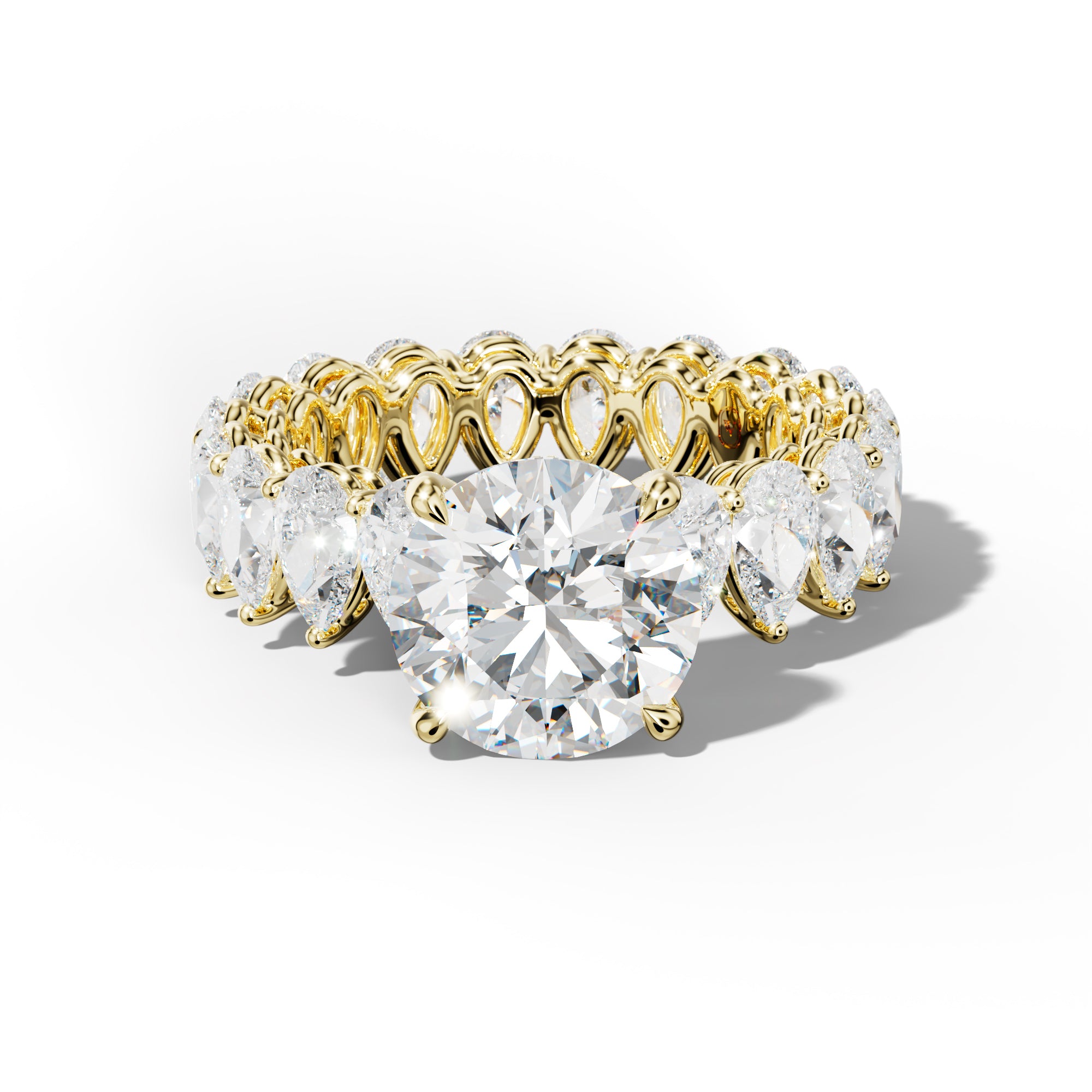 Maya Round Diamond Engagement Ring With Pear Shape Side Stones