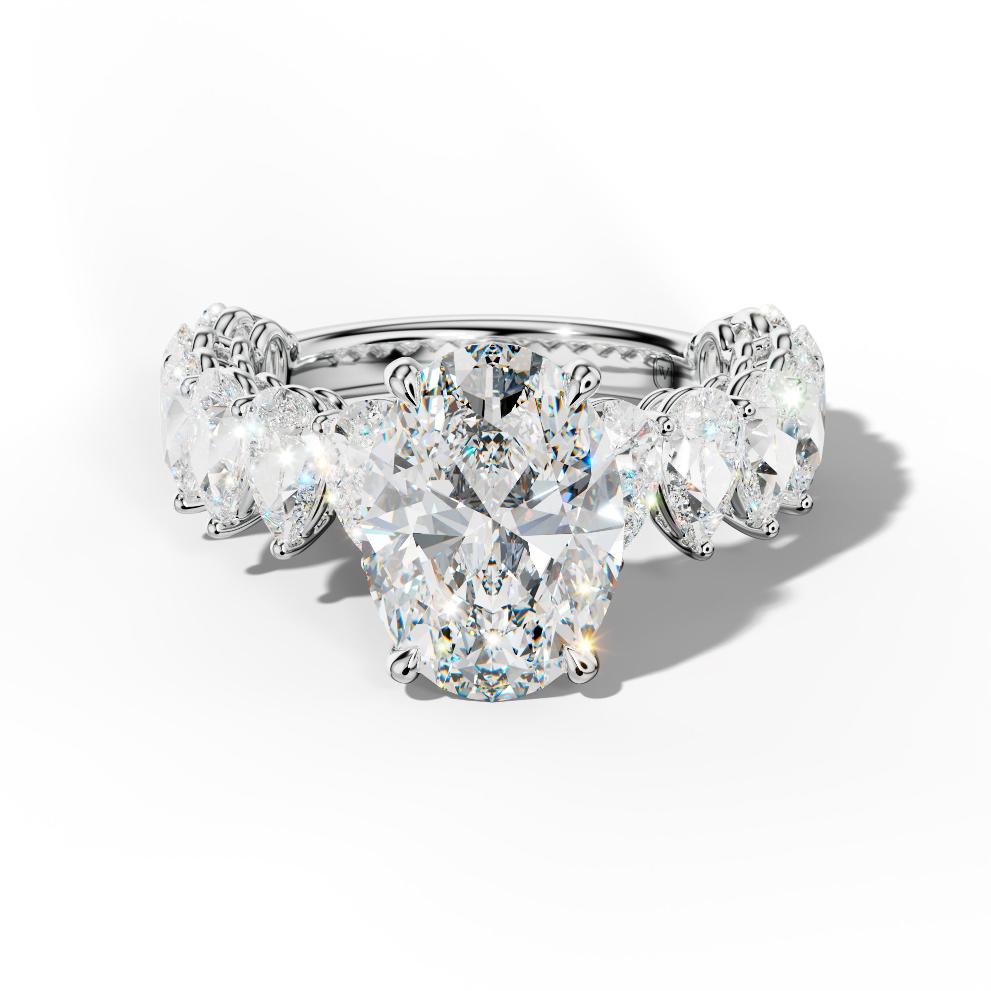 Remi Oval Diamond Engagement Ring With Pear Shape Side Stones