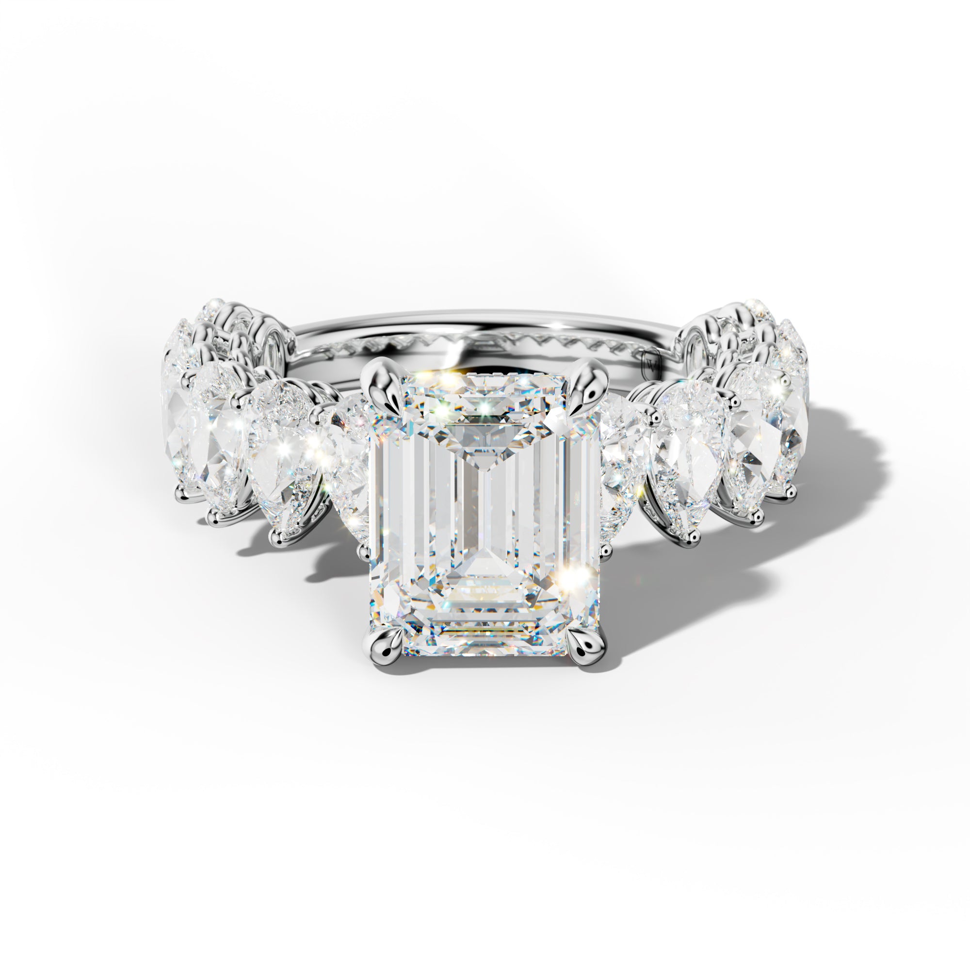 Remi Emerald Cut Diamond Engagement Ring With Pear Shape Side Stones