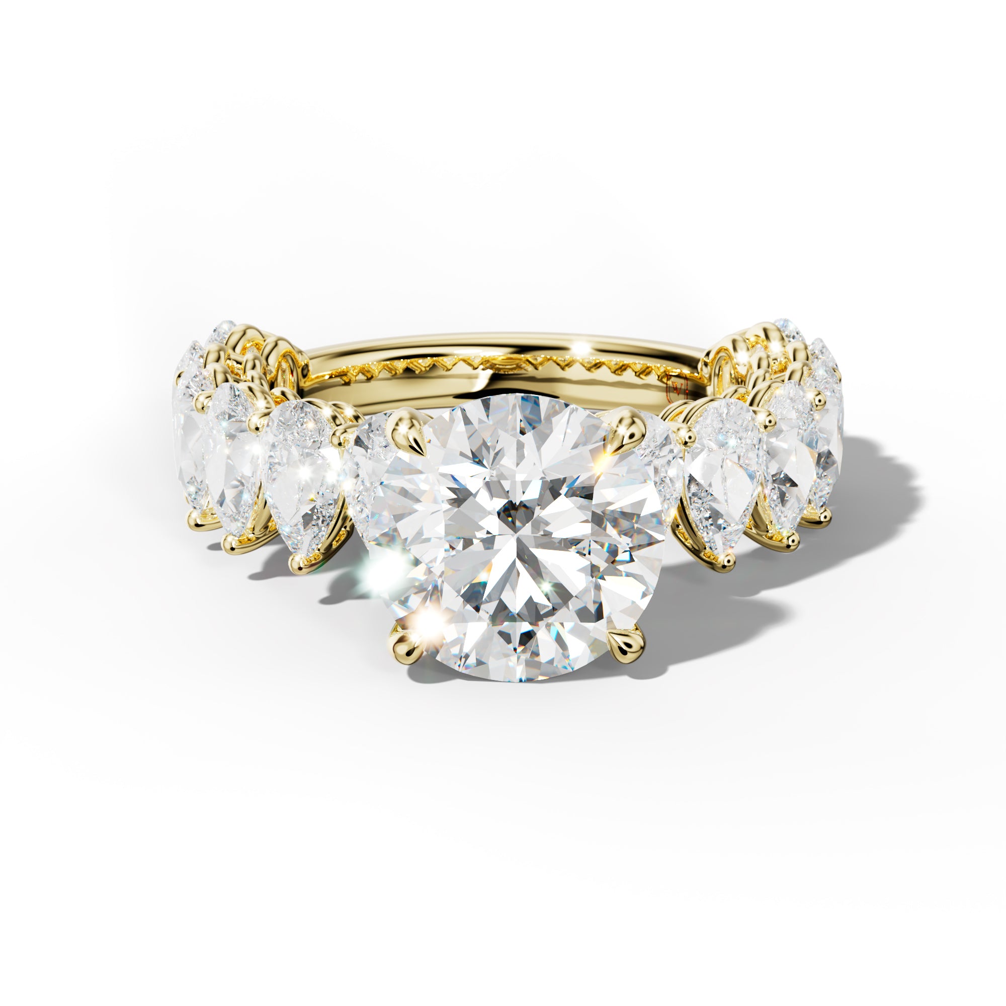 Remi Round Diamond Engagement Ring With Pear Shape Side Stones
