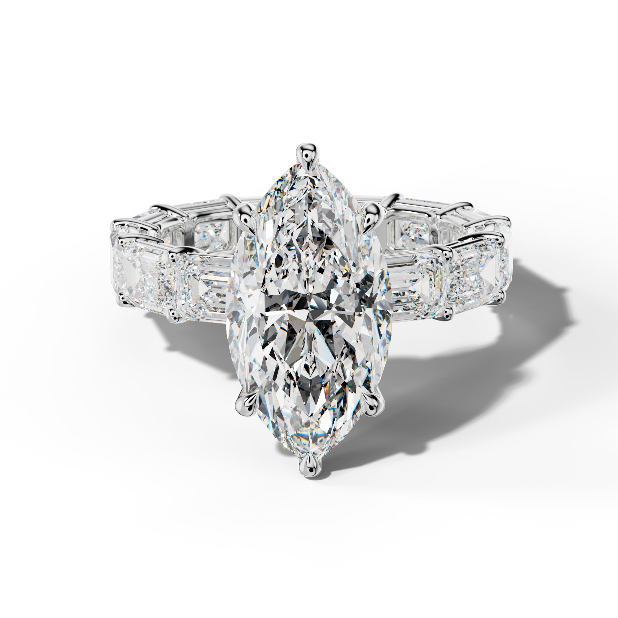 Miracle Marquise Diamond Engagement Ring With East West Emerald Cut Side Stones