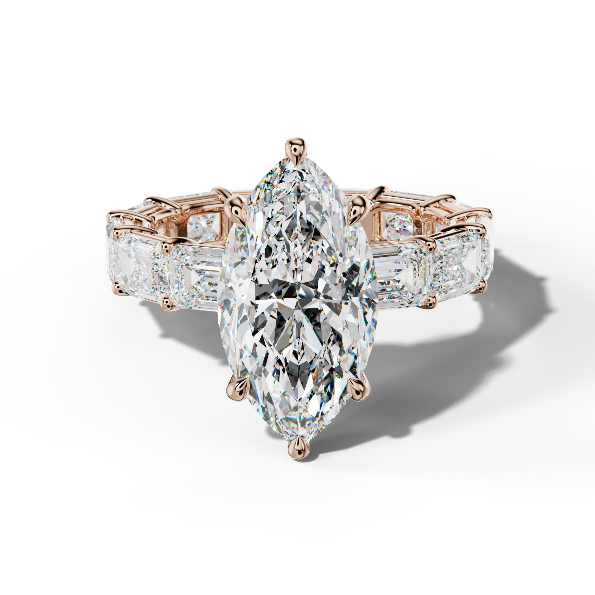 Miracle Marquise Diamond Engagement Ring With East West Emerald Cut Side Stones