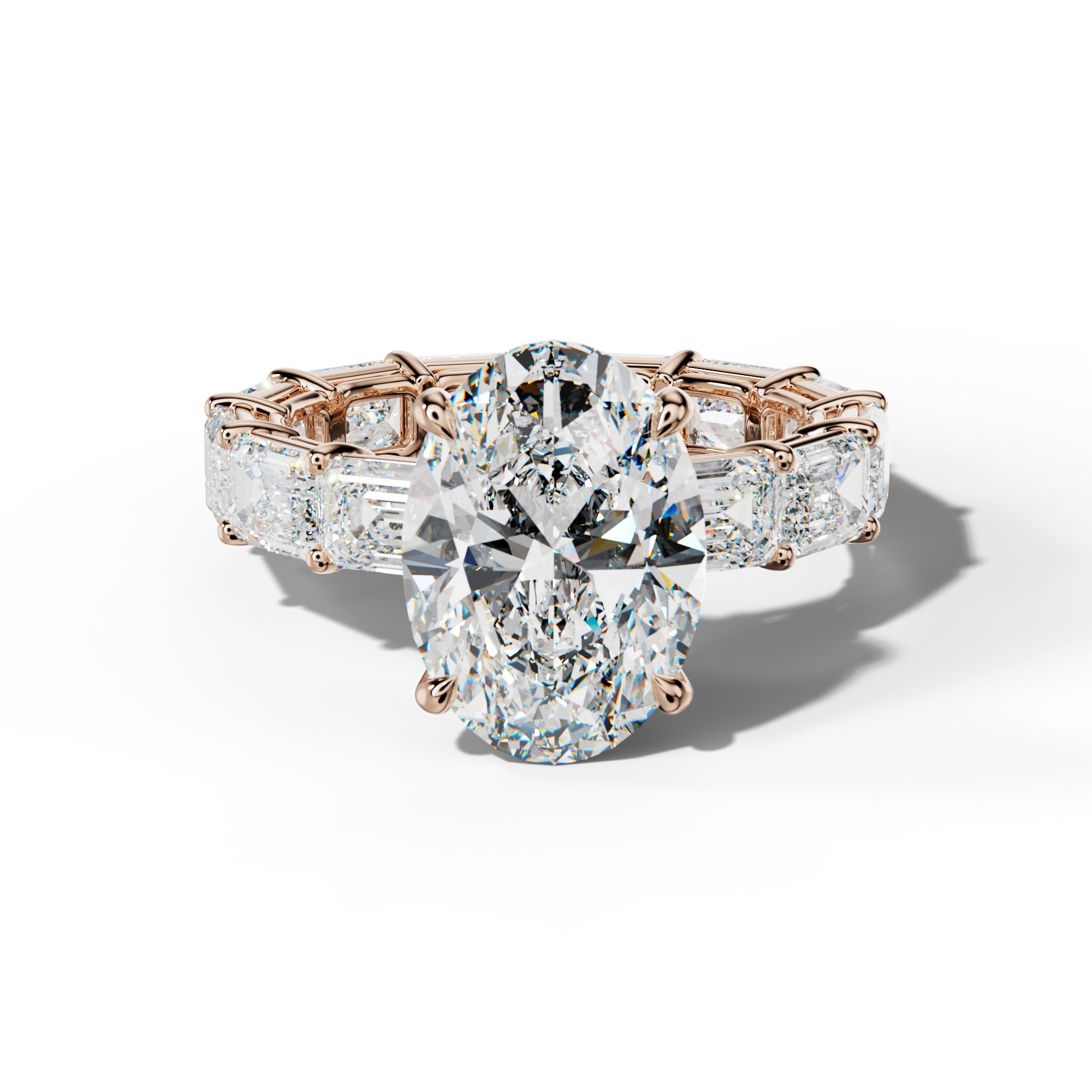 Miracle Oval Diamond Engagement Ring With East West Emerald Cut Side Stones