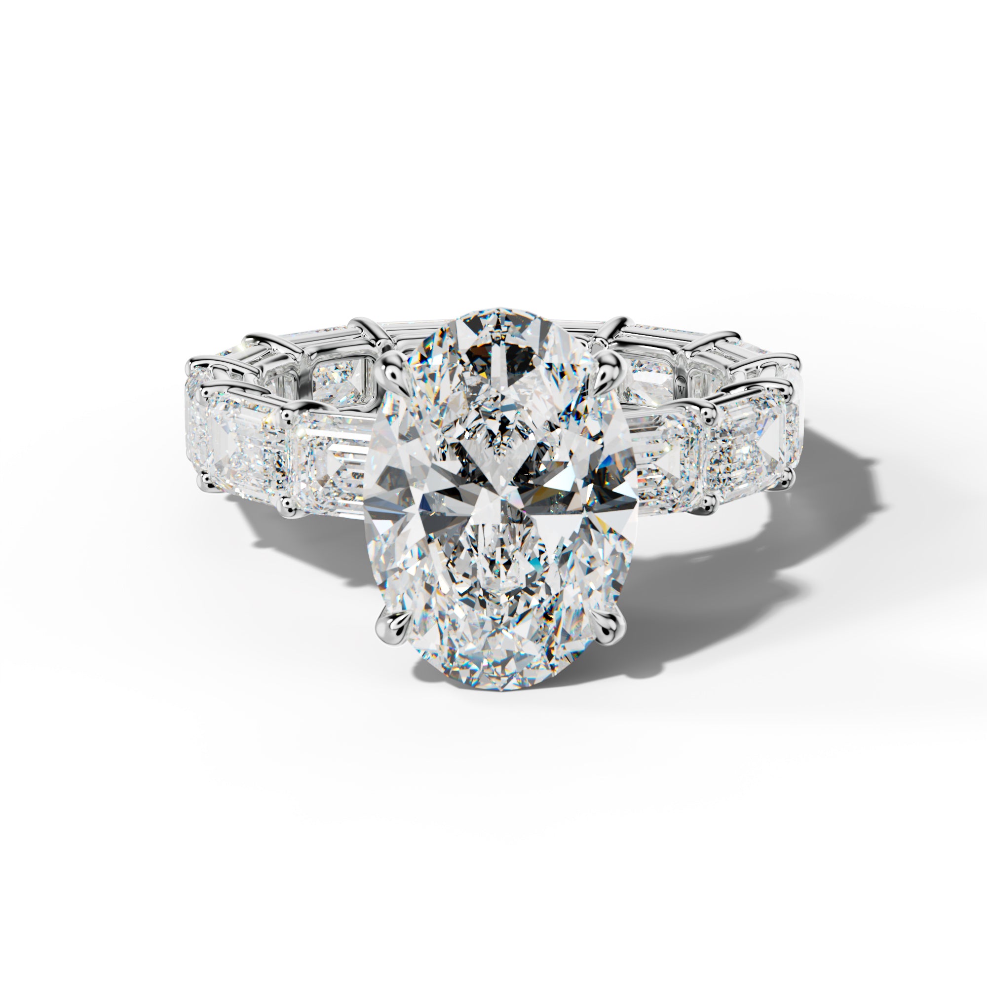 Miracle Oval Diamond Engagement Ring With East West Emerald Cut Side Stones