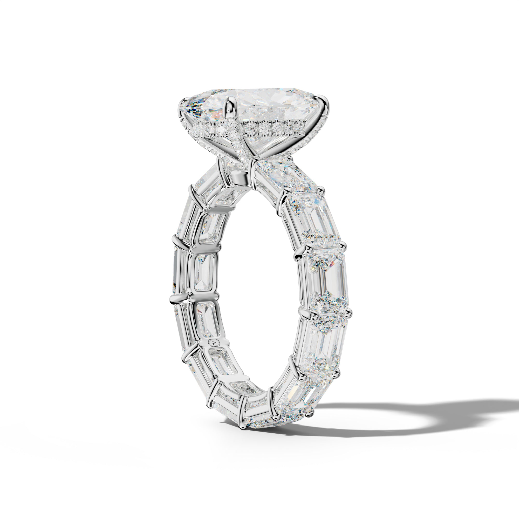 Miracle Oval Diamond Engagement Ring With East West Emerald Cut Side Stones